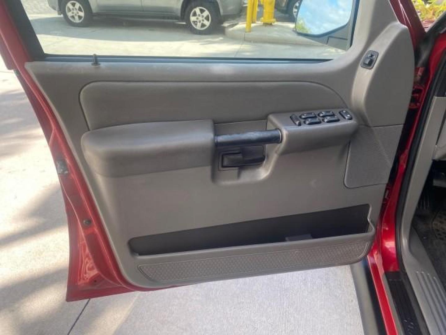 2005 Bright Red /Medium Dark Flint Ford Explorer Sport Trac PU XLS LOW MILES 72,457 (1FMZU67K85U) with an 4.0L SOHC V6 Engine engine, Automatic transmission, located at 4701 North Dixie Hwy, Pompano Beach, FL, 33064, (954) 422-2889, 26.240938, -80.123474 - OUR WEBPAGE FLORIDACARS1.COM HAS OVER 100 PHOTOS AND FREE CARFAX LINK 2005 FORD EXPLORER SPORT TRAC XLS PICKUP VIN: 1FMZU67K85UB51993 1 F M Z U 6 7 K 8 5 U B 5 1 9 9 3 SPORT PICKUP 4.0L V6 F FLEX FUEL 21 MPG REAR WHEEL DRIVE Features ABS Brakes Air Conditioning Alloy Wheels AM/FM Stereo Automatic Tr - Photo#42