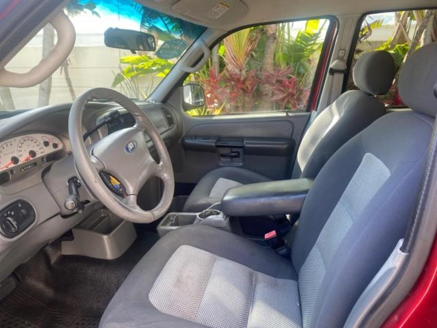 2005 Bright Red /Medium Dark Flint Ford Explorer Sport Trac PU XLS LOW MILES 72,457 (1FMZU67K85U) with an 4.0L SOHC V6 Engine engine, Automatic transmission, located at 4701 North Dixie Hwy, Pompano Beach, FL, 33064, (954) 422-2889, 26.240938, -80.123474 - OUR WEBPAGE FLORIDACARS1.COM HAS OVER 100 PHOTOS AND FREE CARFAX LINK 2005 FORD EXPLORER SPORT TRAC XLS PICKUP VIN: 1FMZU67K85UB51993 1 F M Z U 6 7 K 8 5 U B 5 1 9 9 3 SPORT PICKUP 4.0L V6 F FLEX FUEL 21 MPG REAR WHEEL DRIVE Features ABS Brakes Air Conditioning Alloy Wheels AM/FM Stereo Automatic Tr - Photo#46