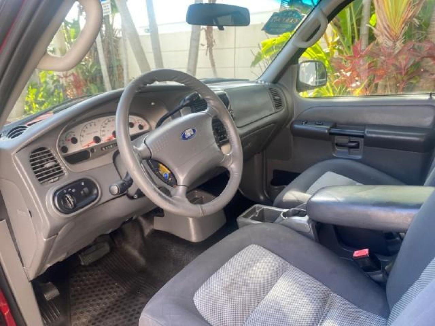 2005 Bright Red /Medium Dark Flint Ford Explorer Sport Trac PU XLS LOW MILES 72,457 (1FMZU67K85U) with an 4.0L SOHC V6 Engine engine, Automatic transmission, located at 4701 North Dixie Hwy, Pompano Beach, FL, 33064, (954) 422-2889, 26.240938, -80.123474 - OUR WEBPAGE FLORIDACARS1.COM HAS OVER 100 PHOTOS AND FREE CARFAX LINK 2005 FORD EXPLORER SPORT TRAC XLS PICKUP VIN: 1FMZU67K85UB51993 1 F M Z U 6 7 K 8 5 U B 5 1 9 9 3 SPORT PICKUP 4.0L V6 F FLEX FUEL 21 MPG REAR WHEEL DRIVE Features ABS Brakes Air Conditioning Alloy Wheels AM/FM Stereo Automatic Tr - Photo#47