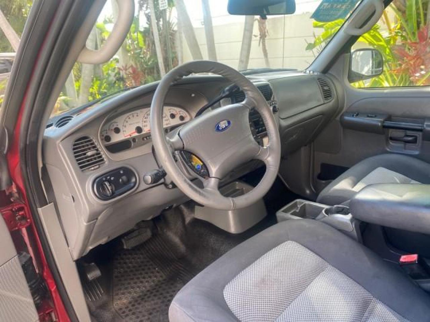 2005 Bright Red /Medium Dark Flint Ford Explorer Sport Trac PU XLS LOW MILES 72,457 (1FMZU67K85U) with an 4.0L SOHC V6 Engine engine, Automatic transmission, located at 4701 North Dixie Hwy, Pompano Beach, FL, 33064, (954) 422-2889, 26.240938, -80.123474 - OUR WEBPAGE FLORIDACARS1.COM HAS OVER 100 PHOTOS AND FREE CARFAX LINK 2005 FORD EXPLORER SPORT TRAC XLS PICKUP VIN: 1FMZU67K85UB51993 1 F M Z U 6 7 K 8 5 U B 5 1 9 9 3 SPORT PICKUP 4.0L V6 F FLEX FUEL 21 MPG REAR WHEEL DRIVE Features ABS Brakes Air Conditioning Alloy Wheels AM/FM Stereo Automatic Tr - Photo#48