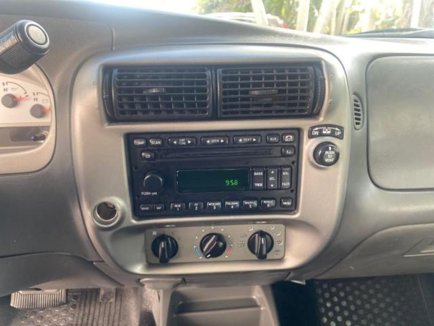 2005 Bright Red /Medium Dark Flint Ford Explorer Sport Trac PU XLS LOW MILES 72,457 (1FMZU67K85U) with an 4.0L SOHC V6 Engine engine, Automatic transmission, located at 4701 North Dixie Hwy, Pompano Beach, FL, 33064, (954) 422-2889, 26.240938, -80.123474 - OUR WEBPAGE FLORIDACARS1.COM HAS OVER 100 PHOTOS AND FREE CARFAX LINK 2005 FORD EXPLORER SPORT TRAC XLS PICKUP VIN: 1FMZU67K85UB51993 1 F M Z U 6 7 K 8 5 U B 5 1 9 9 3 SPORT PICKUP 4.0L V6 F FLEX FUEL 21 MPG REAR WHEEL DRIVE Features ABS Brakes Air Conditioning Alloy Wheels AM/FM Stereo Automatic Tr - Photo#56