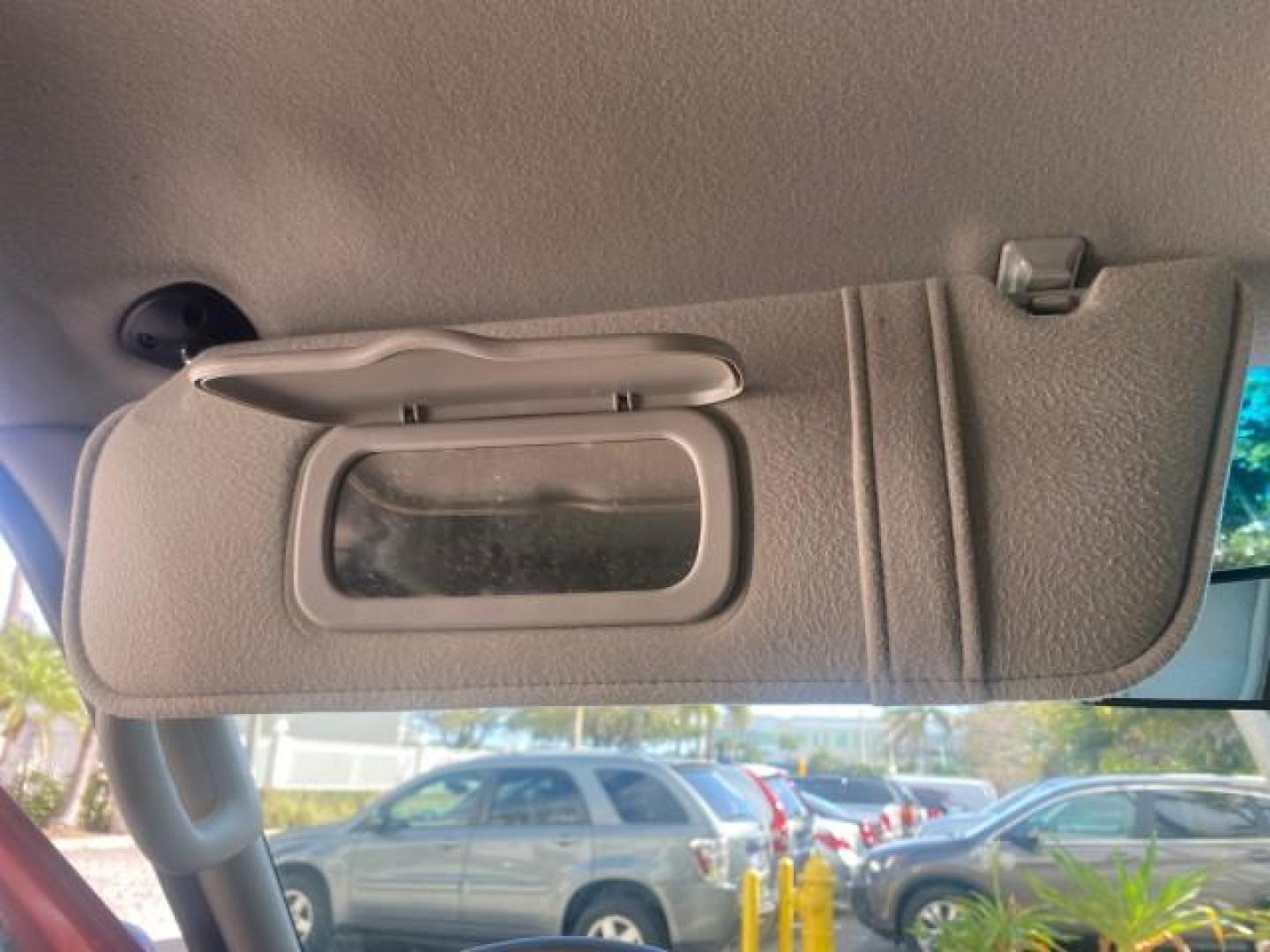 2005 Bright Red /Medium Dark Flint Ford Explorer Sport Trac PU XLS LOW MILES 72,457 (1FMZU67K85U) with an 4.0L SOHC V6 Engine engine, Automatic transmission, located at 4701 North Dixie Hwy, Pompano Beach, FL, 33064, (954) 422-2889, 26.240938, -80.123474 - OUR WEBPAGE FLORIDACARS1.COM HAS OVER 100 PHOTOS AND FREE CARFAX LINK 2005 FORD EXPLORER SPORT TRAC XLS PICKUP VIN: 1FMZU67K85UB51993 1 F M Z U 6 7 K 8 5 U B 5 1 9 9 3 SPORT PICKUP 4.0L V6 F FLEX FUEL 21 MPG REAR WHEEL DRIVE Features ABS Brakes Air Conditioning Alloy Wheels AM/FM Stereo Automatic Tr - Photo#63