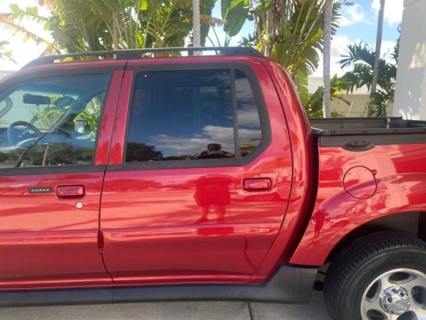 2005 Bright Red /Medium Dark Flint Ford Explorer Sport Trac PU XLS LOW MILES 72,457 (1FMZU67K85U) with an 4.0L SOHC V6 Engine engine, Automatic transmission, located at 4701 North Dixie Hwy, Pompano Beach, FL, 33064, (954) 422-2889, 26.240938, -80.123474 - OUR WEBPAGE FLORIDACARS1.COM HAS OVER 100 PHOTOS AND FREE CARFAX LINK 2005 FORD EXPLORER SPORT TRAC XLS PICKUP VIN: 1FMZU67K85UB51993 1 F M Z U 6 7 K 8 5 U B 5 1 9 9 3 SPORT PICKUP 4.0L V6 F FLEX FUEL 21 MPG REAR WHEEL DRIVE Features ABS Brakes Air Conditioning Alloy Wheels AM/FM Stereo Automatic Tr - Photo#67