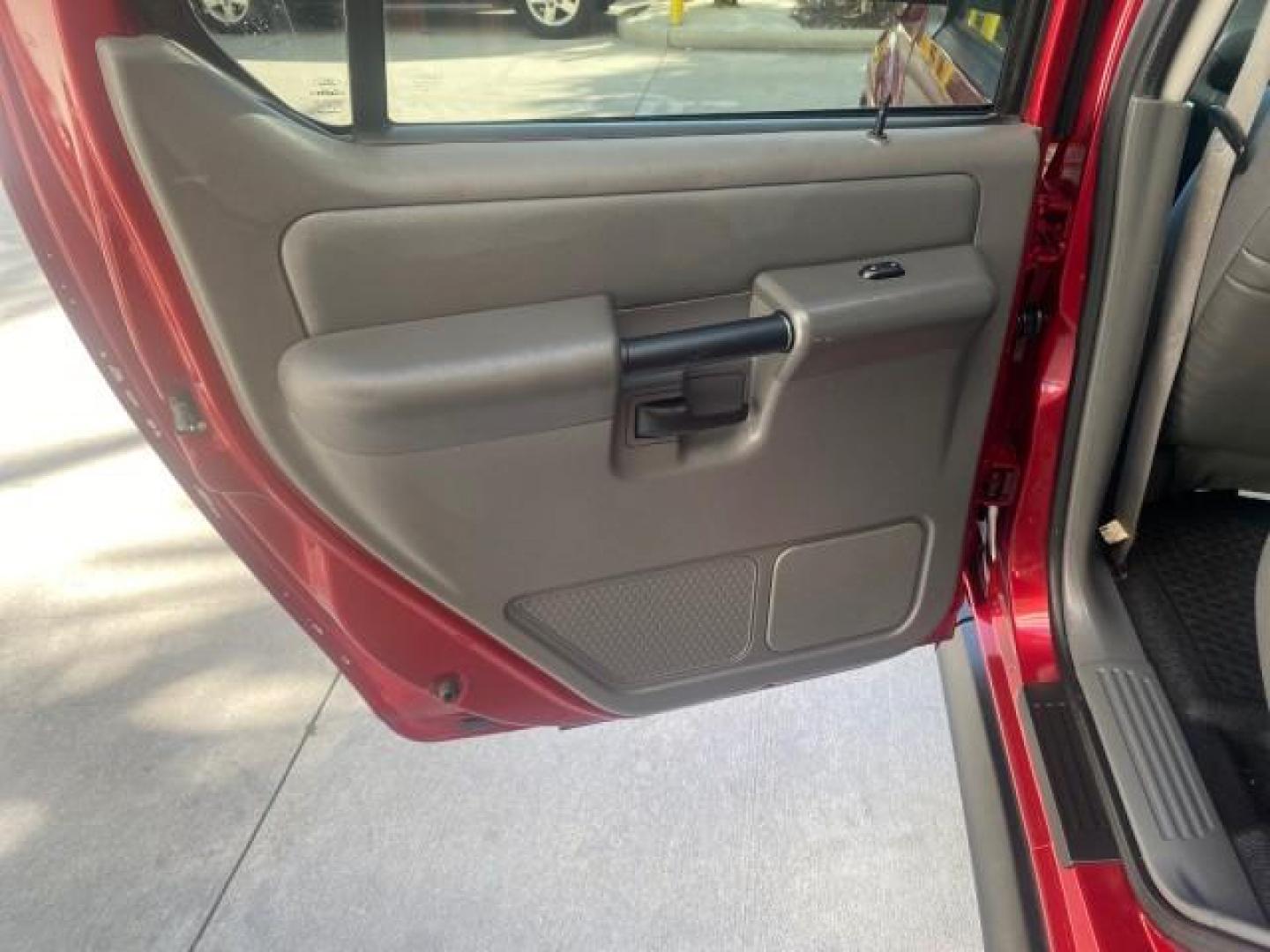 2005 Bright Red /Medium Dark Flint Ford Explorer Sport Trac PU XLS LOW MILES 72,457 (1FMZU67K85U) with an 4.0L SOHC V6 Engine engine, Automatic transmission, located at 4701 North Dixie Hwy, Pompano Beach, FL, 33064, (954) 422-2889, 26.240938, -80.123474 - OUR WEBPAGE FLORIDACARS1.COM HAS OVER 100 PHOTOS AND FREE CARFAX LINK 2005 FORD EXPLORER SPORT TRAC XLS PICKUP VIN: 1FMZU67K85UB51993 1 F M Z U 6 7 K 8 5 U B 5 1 9 9 3 SPORT PICKUP 4.0L V6 F FLEX FUEL 21 MPG REAR WHEEL DRIVE Features ABS Brakes Air Conditioning Alloy Wheels AM/FM Stereo Automatic Tr - Photo#69