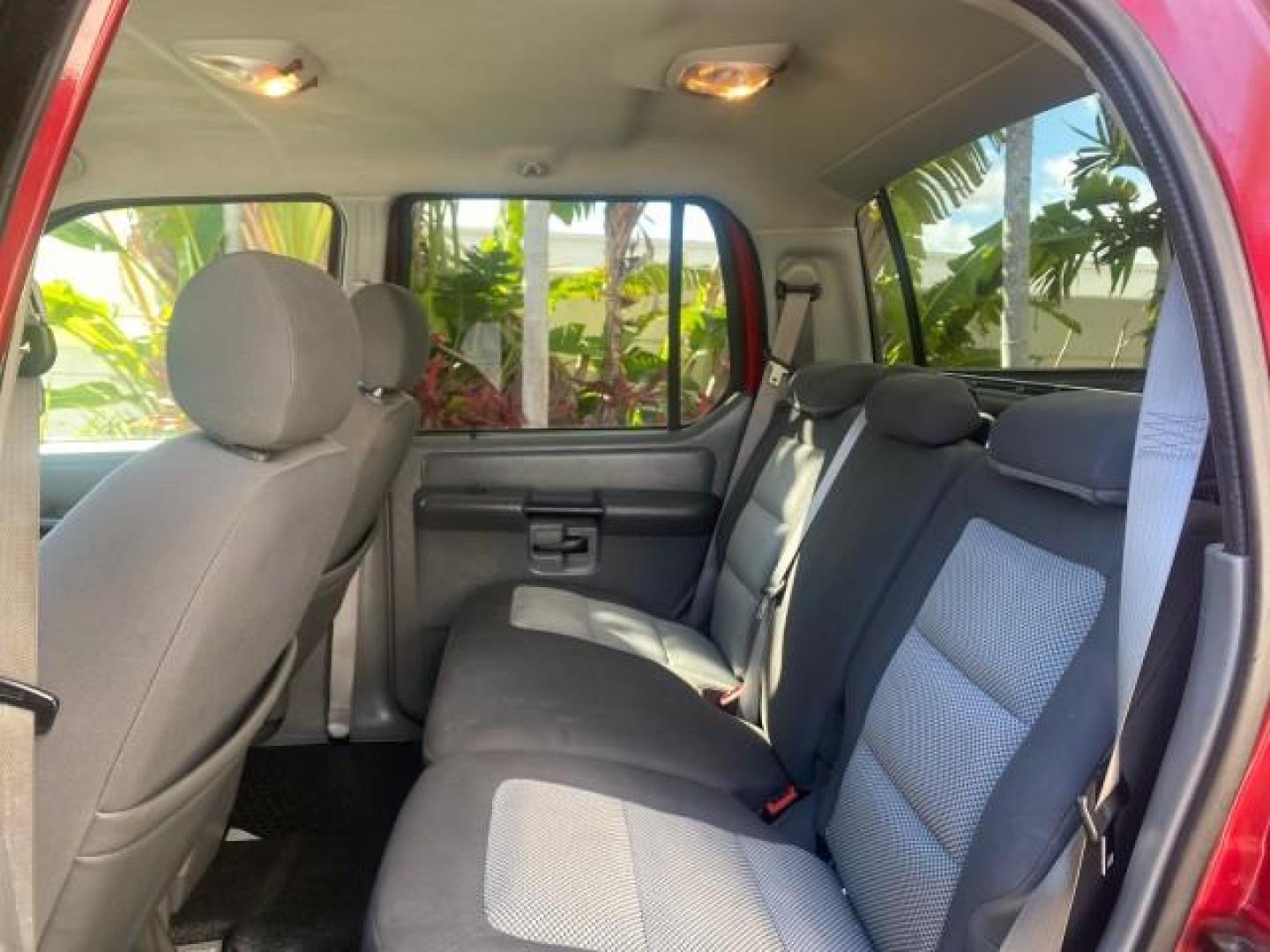 2005 Bright Red /Medium Dark Flint Ford Explorer Sport Trac PU XLS LOW MILES 72,457 (1FMZU67K85U) with an 4.0L SOHC V6 Engine engine, Automatic transmission, located at 4701 North Dixie Hwy, Pompano Beach, FL, 33064, (954) 422-2889, 26.240938, -80.123474 - OUR WEBPAGE FLORIDACARS1.COM HAS OVER 100 PHOTOS AND FREE CARFAX LINK 2005 FORD EXPLORER SPORT TRAC XLS PICKUP VIN: 1FMZU67K85UB51993 1 F M Z U 6 7 K 8 5 U B 5 1 9 9 3 SPORT PICKUP 4.0L V6 F FLEX FUEL 21 MPG REAR WHEEL DRIVE Features ABS Brakes Air Conditioning Alloy Wheels AM/FM Stereo Automatic Tr - Photo#70