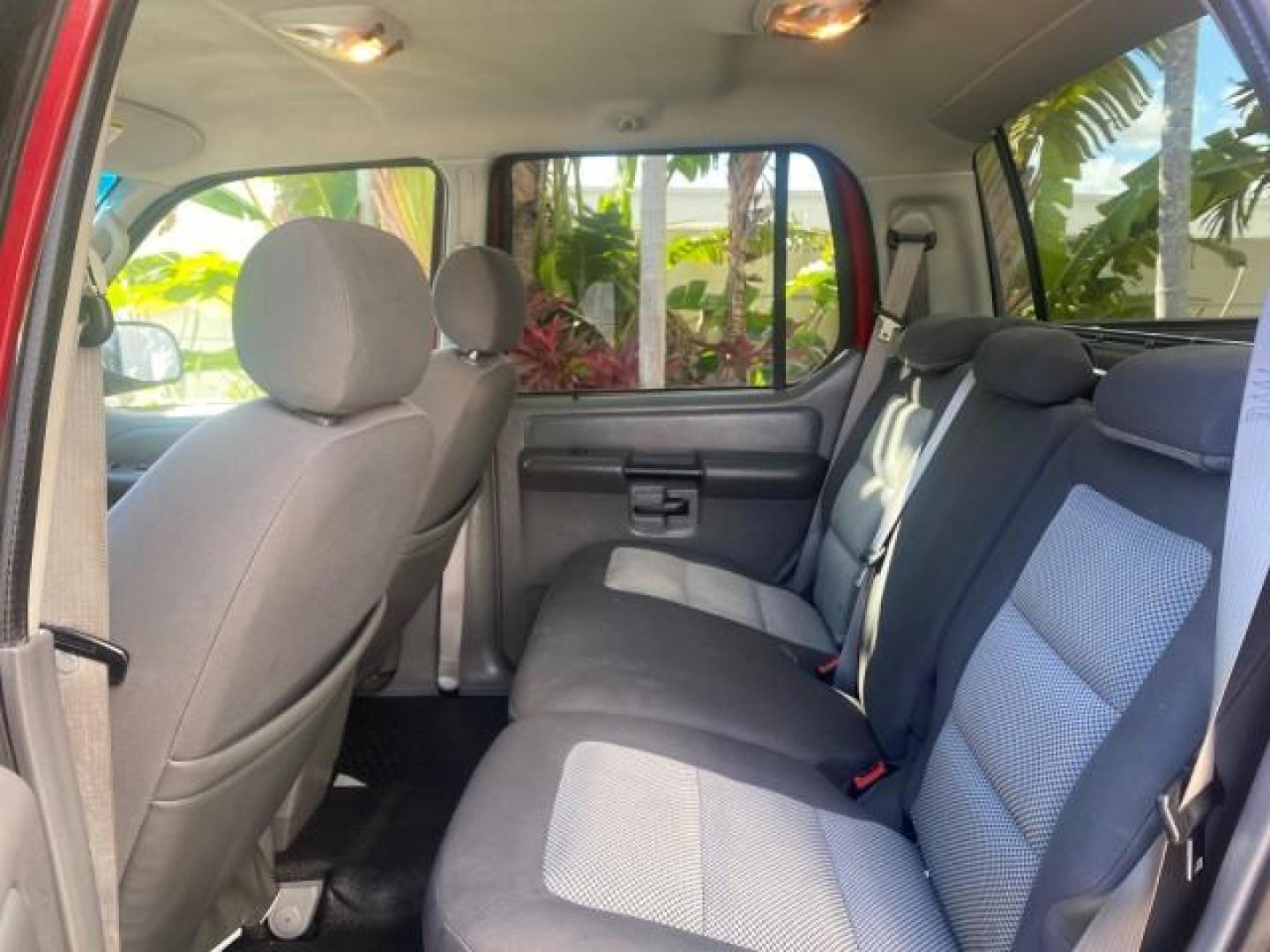 2005 Bright Red /Medium Dark Flint Ford Explorer Sport Trac PU XLS LOW MILES 72,457 (1FMZU67K85U) with an 4.0L SOHC V6 Engine engine, Automatic transmission, located at 4701 North Dixie Hwy, Pompano Beach, FL, 33064, (954) 422-2889, 26.240938, -80.123474 - OUR WEBPAGE FLORIDACARS1.COM HAS OVER 100 PHOTOS AND FREE CARFAX LINK 2005 FORD EXPLORER SPORT TRAC XLS PICKUP VIN: 1FMZU67K85UB51993 1 F M Z U 6 7 K 8 5 U B 5 1 9 9 3 SPORT PICKUP 4.0L V6 F FLEX FUEL 21 MPG REAR WHEEL DRIVE Features ABS Brakes Air Conditioning Alloy Wheels AM/FM Stereo Automatic Tr - Photo#71