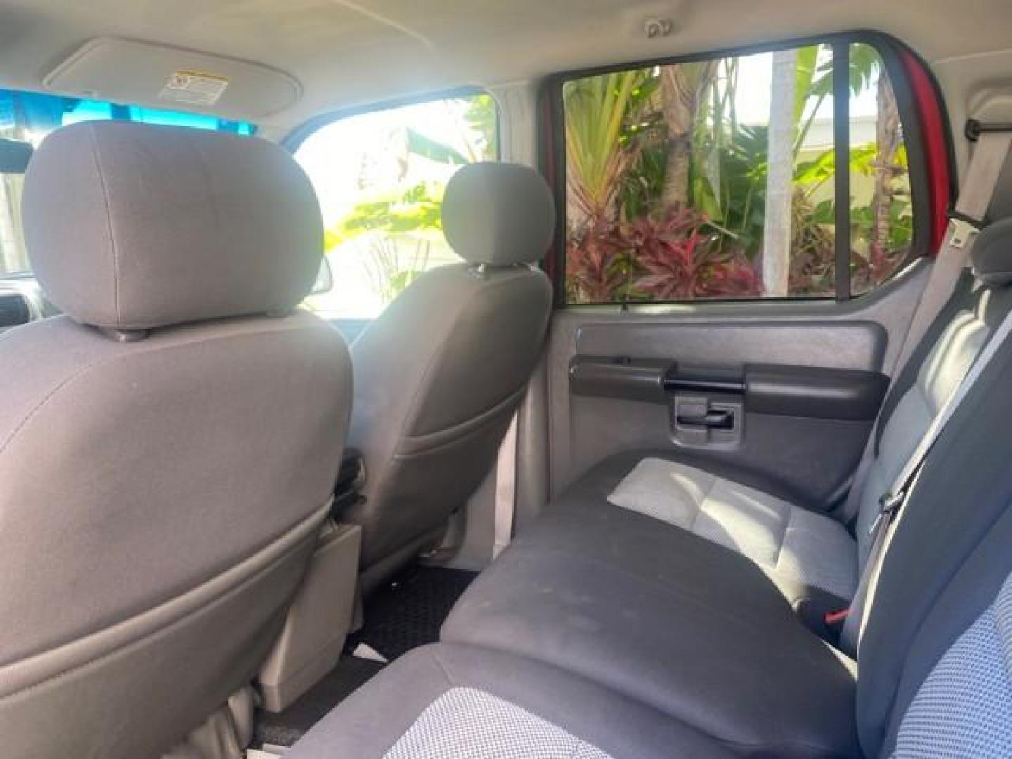 2005 Bright Red /Medium Dark Flint Ford Explorer Sport Trac PU XLS LOW MILES 72,457 (1FMZU67K85U) with an 4.0L SOHC V6 Engine engine, Automatic transmission, located at 4701 North Dixie Hwy, Pompano Beach, FL, 33064, (954) 422-2889, 26.240938, -80.123474 - OUR WEBPAGE FLORIDACARS1.COM HAS OVER 100 PHOTOS AND FREE CARFAX LINK 2005 FORD EXPLORER SPORT TRAC XLS PICKUP VIN: 1FMZU67K85UB51993 1 F M Z U 6 7 K 8 5 U B 5 1 9 9 3 SPORT PICKUP 4.0L V6 F FLEX FUEL 21 MPG REAR WHEEL DRIVE Features ABS Brakes Air Conditioning Alloy Wheels AM/FM Stereo Automatic Tr - Photo#72