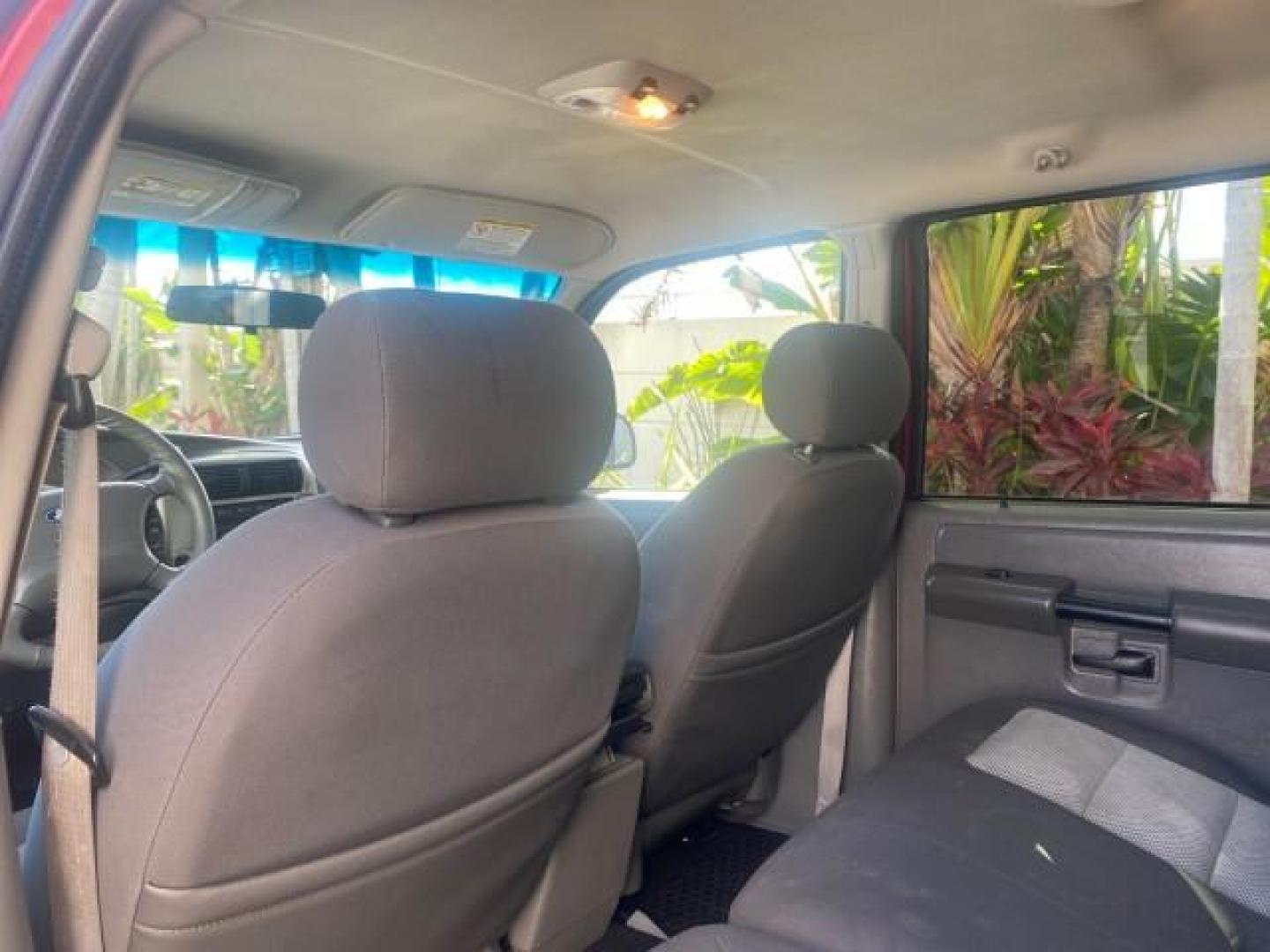 2005 Bright Red /Medium Dark Flint Ford Explorer Sport Trac PU XLS LOW MILES 72,457 (1FMZU67K85U) with an 4.0L SOHC V6 Engine engine, Automatic transmission, located at 4701 North Dixie Hwy, Pompano Beach, FL, 33064, (954) 422-2889, 26.240938, -80.123474 - OUR WEBPAGE FLORIDACARS1.COM HAS OVER 100 PHOTOS AND FREE CARFAX LINK 2005 FORD EXPLORER SPORT TRAC XLS PICKUP VIN: 1FMZU67K85UB51993 1 F M Z U 6 7 K 8 5 U B 5 1 9 9 3 SPORT PICKUP 4.0L V6 F FLEX FUEL 21 MPG REAR WHEEL DRIVE Features ABS Brakes Air Conditioning Alloy Wheels AM/FM Stereo Automatic Tr - Photo#73