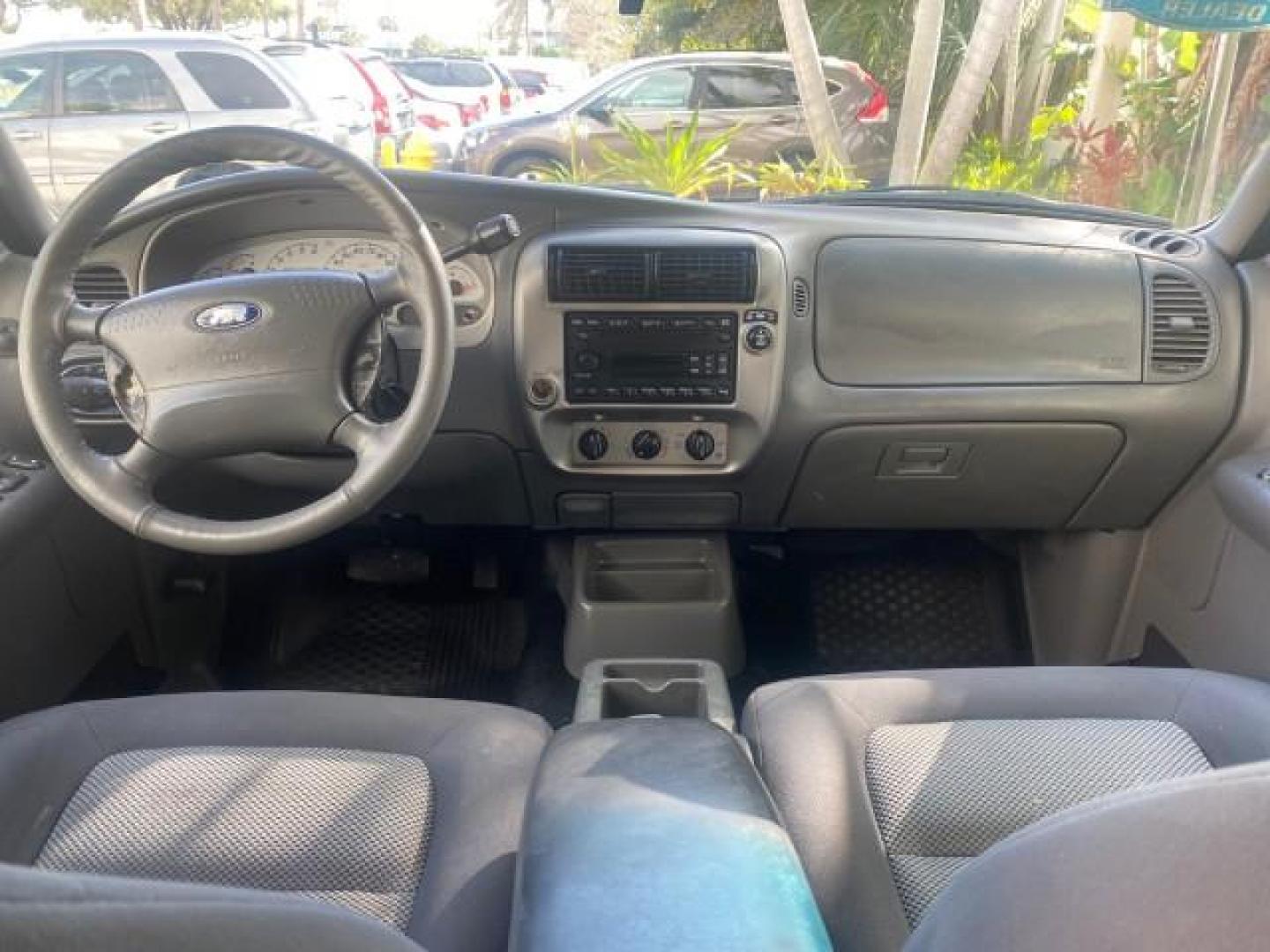 2005 Bright Red /Medium Dark Flint Ford Explorer Sport Trac PU XLS LOW MILES 72,457 (1FMZU67K85U) with an 4.0L SOHC V6 Engine engine, Automatic transmission, located at 4701 North Dixie Hwy, Pompano Beach, FL, 33064, (954) 422-2889, 26.240938, -80.123474 - OUR WEBPAGE FLORIDACARS1.COM HAS OVER 100 PHOTOS AND FREE CARFAX LINK 2005 FORD EXPLORER SPORT TRAC XLS PICKUP VIN: 1FMZU67K85UB51993 1 F M Z U 6 7 K 8 5 U B 5 1 9 9 3 SPORT PICKUP 4.0L V6 F FLEX FUEL 21 MPG REAR WHEEL DRIVE Features ABS Brakes Air Conditioning Alloy Wheels AM/FM Stereo Automatic Tr - Photo#74