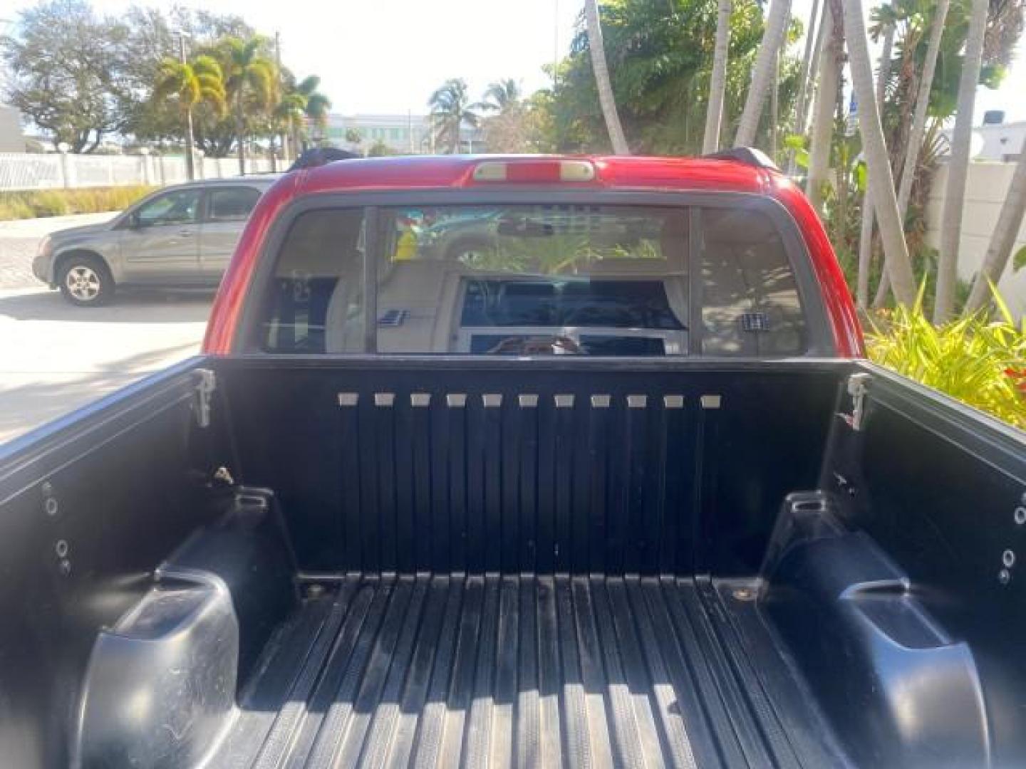 2005 Bright Red /Medium Dark Flint Ford Explorer Sport Trac PU XLS LOW MILES 72,457 (1FMZU67K85U) with an 4.0L SOHC V6 Engine engine, Automatic transmission, located at 4701 North Dixie Hwy, Pompano Beach, FL, 33064, (954) 422-2889, 26.240938, -80.123474 - OUR WEBPAGE FLORIDACARS1.COM HAS OVER 100 PHOTOS AND FREE CARFAX LINK 2005 FORD EXPLORER SPORT TRAC XLS PICKUP VIN: 1FMZU67K85UB51993 1 F M Z U 6 7 K 8 5 U B 5 1 9 9 3 SPORT PICKUP 4.0L V6 F FLEX FUEL 21 MPG REAR WHEEL DRIVE Features ABS Brakes Air Conditioning Alloy Wheels AM/FM Stereo Automatic Tr - Photo#86