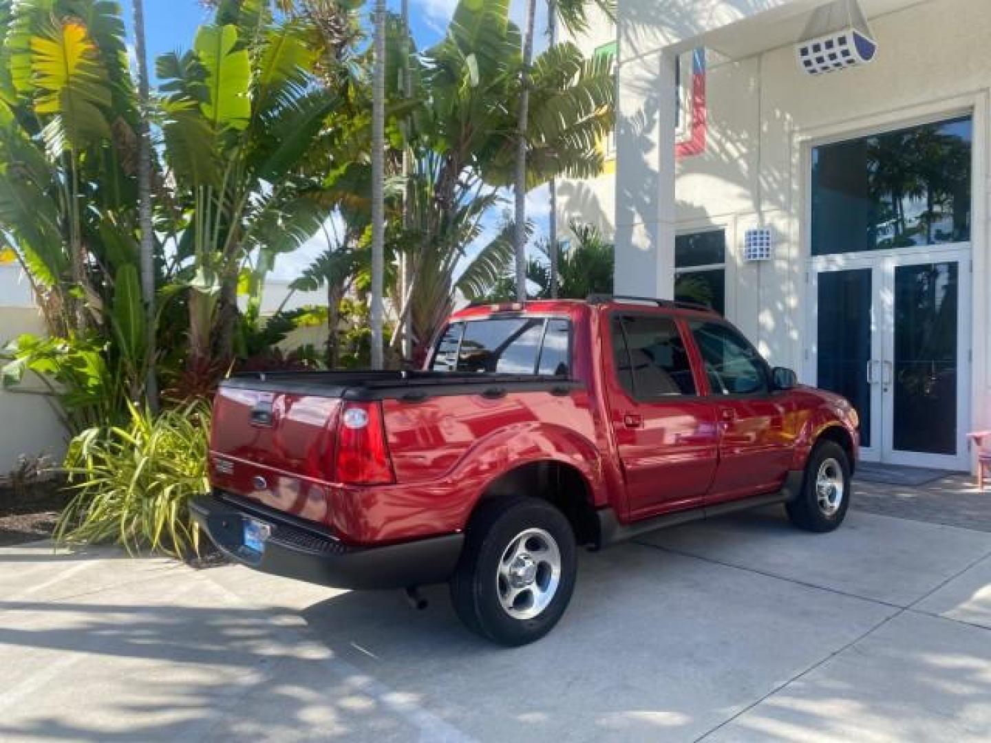 2005 Bright Red /Medium Dark Flint Ford Explorer Sport Trac PU XLS LOW MILES 72,457 (1FMZU67K85U) with an 4.0L SOHC V6 Engine engine, Automatic transmission, located at 4701 North Dixie Hwy, Pompano Beach, FL, 33064, (954) 422-2889, 26.240938, -80.123474 - OUR WEBPAGE FLORIDACARS1.COM HAS OVER 100 PHOTOS AND FREE CARFAX LINK 2005 FORD EXPLORER SPORT TRAC XLS PICKUP VIN: 1FMZU67K85UB51993 1 F M Z U 6 7 K 8 5 U B 5 1 9 9 3 SPORT PICKUP 4.0L V6 F FLEX FUEL 21 MPG REAR WHEEL DRIVE Features ABS Brakes Air Conditioning Alloy Wheels AM/FM Stereo Automatic Tr - Photo#97