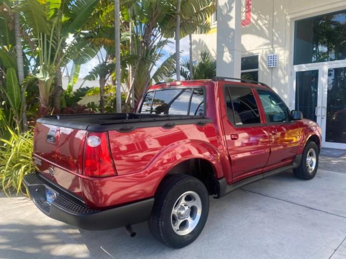 2005 Bright Red /Medium Dark Flint Ford Explorer Sport Trac PU XLS LOW MILES 72,457 (1FMZU67K85U) with an 4.0L SOHC V6 Engine engine, Automatic transmission, located at 4701 North Dixie Hwy, Pompano Beach, FL, 33064, (954) 422-2889, 26.240938, -80.123474 - OUR WEBPAGE FLORIDACARS1.COM HAS OVER 100 PHOTOS AND FREE CARFAX LINK 2005 FORD EXPLORER SPORT TRAC XLS PICKUP VIN: 1FMZU67K85UB51993 1 F M Z U 6 7 K 8 5 U B 5 1 9 9 3 SPORT PICKUP 4.0L V6 F FLEX FUEL 21 MPG REAR WHEEL DRIVE Features ABS Brakes Air Conditioning Alloy Wheels AM/FM Stereo Automatic Tr - Photo#98