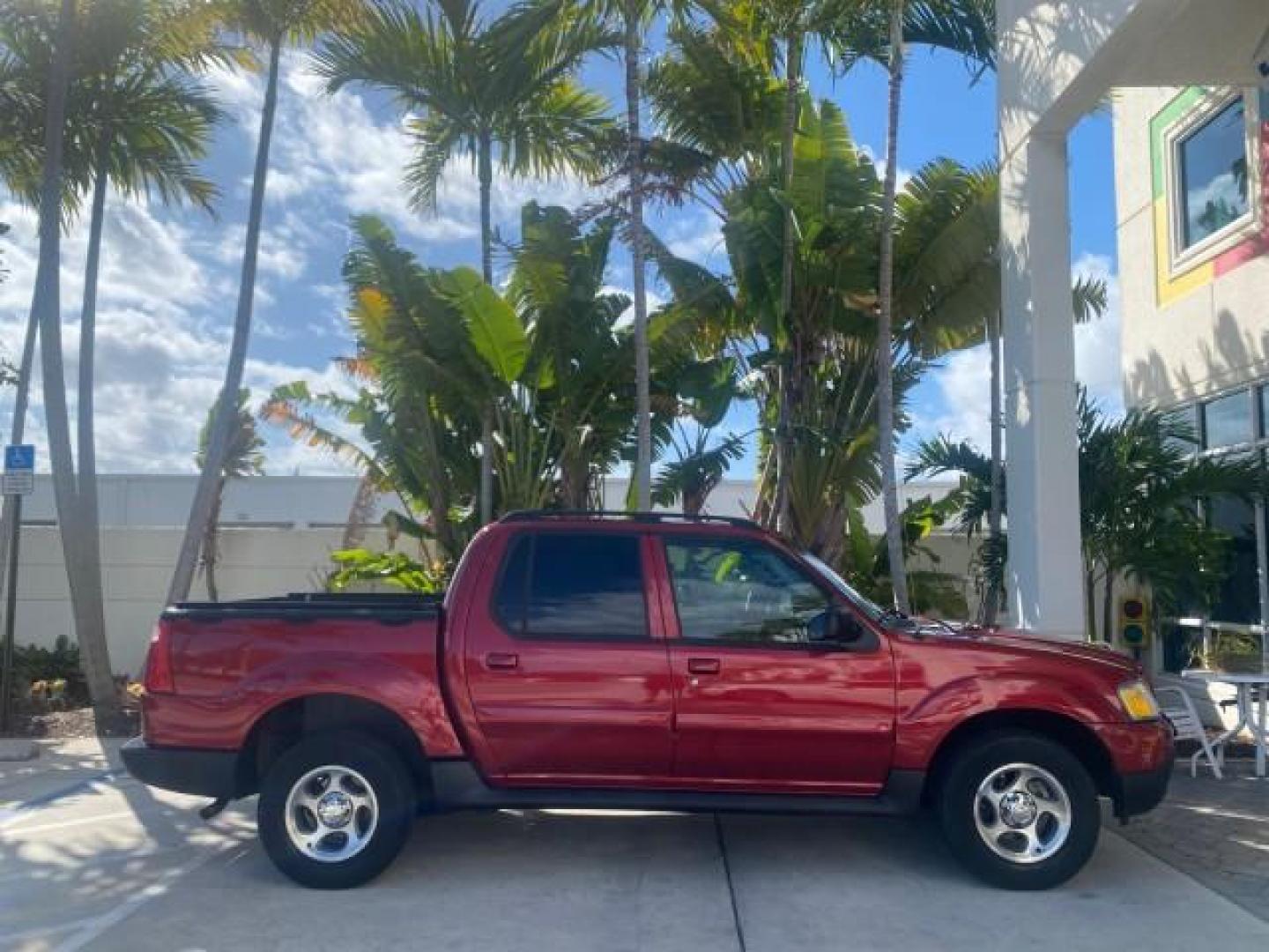 2005 Bright Red /Medium Dark Flint Ford Explorer Sport Trac PU XLS LOW MILES 72,457 (1FMZU67K85U) with an 4.0L SOHC V6 Engine engine, Automatic transmission, located at 4701 North Dixie Hwy, Pompano Beach, FL, 33064, (954) 422-2889, 26.240938, -80.123474 - OUR WEBPAGE FLORIDACARS1.COM HAS OVER 100 PHOTOS AND FREE CARFAX LINK 2005 FORD EXPLORER SPORT TRAC XLS PICKUP VIN: 1FMZU67K85UB51993 1 F M Z U 6 7 K 8 5 U B 5 1 9 9 3 SPORT PICKUP 4.0L V6 F FLEX FUEL 21 MPG REAR WHEEL DRIVE Features ABS Brakes Air Conditioning Alloy Wheels AM/FM Stereo Automatic Tr - Photo#99