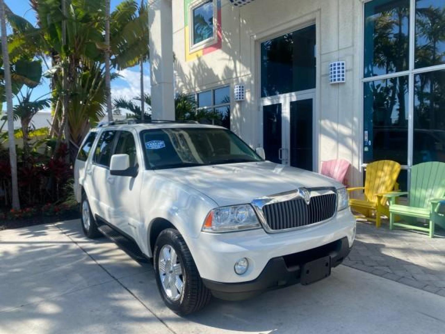 2003 Ceramic White /Light Parchment Lincoln Aviator Premium 4WD SUNROOF (5LMEU78H03Z) with an 4.6L DOHC 32-Valve V8 Engine engine, Automatic transmission, located at 4701 North Dixie Hwy, Pompano Beach, FL, 33064, (954) 422-2889, 26.240938, -80.123474 - OUR WEBPAGE FLORIDACARS1.COM HAS OVER 100 PHOTOS AND FREE CARFAX LINK 2003 LINCOLN AVIATOR PREMIUM 4WD SUNROOF $45,120 NEW TIRES LOOK VERY NICE VIN: 5LMEU78H03ZJ14425 5 L M E U 7 8 H 0 3 Z J 1 4 4 2 5 4 DOOR WAGON/SPORT UTILITY 4.6L V8 F DOHC GASOLINE 18 MPG REAR WHEEL DRIVE W/ 4X4 Features 4WD/AWD - Photo#1