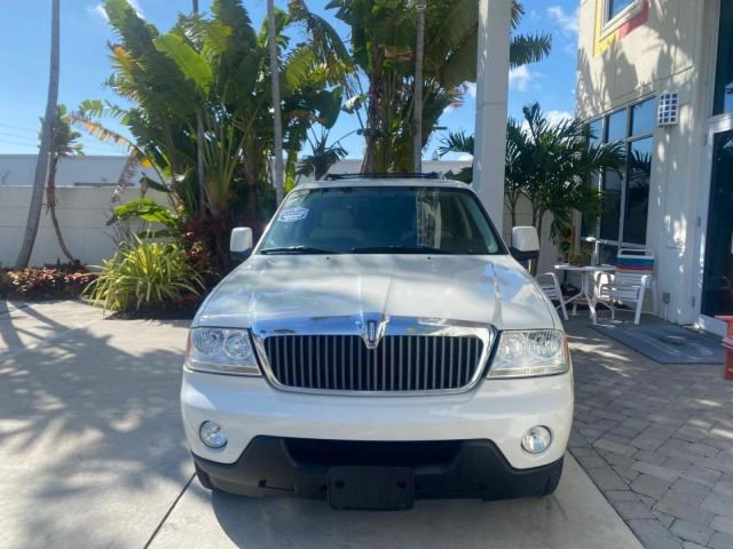 2003 Ceramic White /Light Parchment Lincoln Aviator Premium 4WD SUNROOF (5LMEU78H03Z) with an 4.6L DOHC 32-Valve V8 Engine engine, Automatic transmission, located at 4701 North Dixie Hwy, Pompano Beach, FL, 33064, (954) 422-2889, 26.240938, -80.123474 - OUR WEBPAGE FLORIDACARS1.COM HAS OVER 100 PHOTOS AND FREE CARFAX LINK 2003 LINCOLN AVIATOR PREMIUM 4WD SUNROOF $45,120 NEW TIRES LOOK VERY NICE VIN: 5LMEU78H03ZJ14425 5 L M E U 7 8 H 0 3 Z J 1 4 4 2 5 4 DOOR WAGON/SPORT UTILITY 4.6L V8 F DOHC GASOLINE 18 MPG REAR WHEEL DRIVE W/ 4X4 Features 4WD/AWD - Photo#2