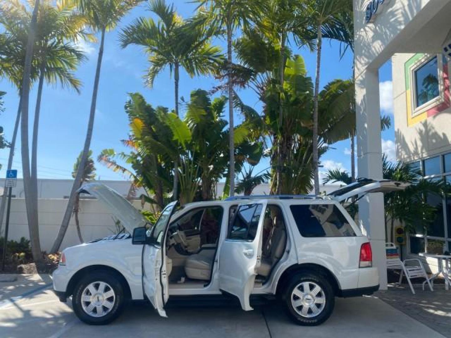2003 Ceramic White /Light Parchment Lincoln Aviator Premium 4WD SUNROOF (5LMEU78H03Z) with an 4.6L DOHC 32-Valve V8 Engine engine, Automatic transmission, located at 4701 North Dixie Hwy, Pompano Beach, FL, 33064, (954) 422-2889, 26.240938, -80.123474 - OUR WEBPAGE FLORIDACARS1.COM HAS OVER 100 PHOTOS AND FREE CARFAX LINK 2003 LINCOLN AVIATOR PREMIUM 4WD SUNROOF $45,120 NEW TIRES LOOK VERY NICE VIN: 5LMEU78H03ZJ14425 5 L M E U 7 8 H 0 3 Z J 1 4 4 2 5 4 DOOR WAGON/SPORT UTILITY 4.6L V8 F DOHC GASOLINE 18 MPG REAR WHEEL DRIVE W/ 4X4 Features 4WD/AWD - Photo#8