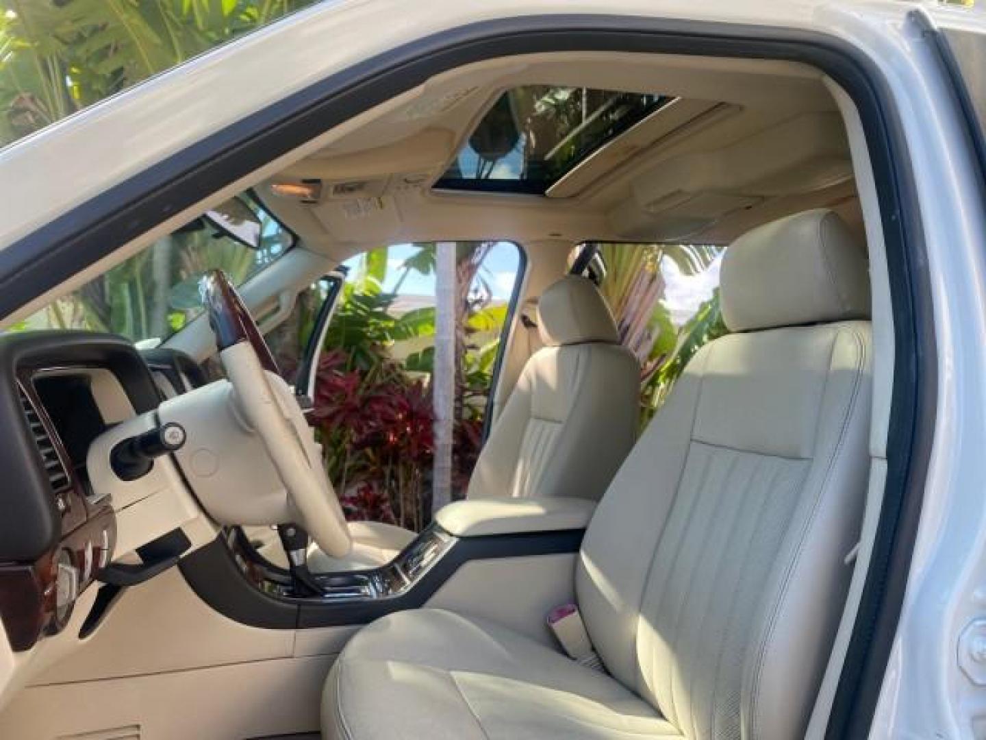 2003 Ceramic White /Light Parchment Lincoln Aviator Premium 4WD SUNROOF (5LMEU78H03Z) with an 4.6L DOHC 32-Valve V8 Engine engine, Automatic transmission, located at 4701 North Dixie Hwy, Pompano Beach, FL, 33064, (954) 422-2889, 26.240938, -80.123474 - OUR WEBPAGE FLORIDACARS1.COM HAS OVER 100 PHOTOS AND FREE CARFAX LINK 2003 LINCOLN AVIATOR PREMIUM 4WD SUNROOF $45,120 NEW TIRES LOOK VERY NICE VIN: 5LMEU78H03ZJ14425 5 L M E U 7 8 H 0 3 Z J 1 4 4 2 5 4 DOOR WAGON/SPORT UTILITY 4.6L V8 F DOHC GASOLINE 18 MPG REAR WHEEL DRIVE W/ 4X4 Features 4WD/AWD - Photo#10