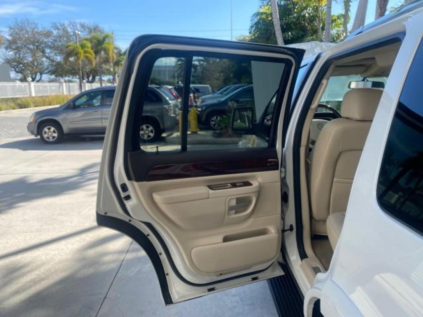 2003 Ceramic White /Light Parchment Lincoln Aviator Premium 4WD SUNROOF (5LMEU78H03Z) with an 4.6L DOHC 32-Valve V8 Engine engine, Automatic transmission, located at 4701 North Dixie Hwy, Pompano Beach, FL, 33064, (954) 422-2889, 26.240938, -80.123474 - OUR WEBPAGE FLORIDACARS1.COM HAS OVER 100 PHOTOS AND FREE CARFAX LINK 2003 LINCOLN AVIATOR PREMIUM 4WD SUNROOF $45,120 NEW TIRES LOOK VERY NICE VIN: 5LMEU78H03ZJ14425 5 L M E U 7 8 H 0 3 Z J 1 4 4 2 5 4 DOOR WAGON/SPORT UTILITY 4.6L V8 F DOHC GASOLINE 18 MPG REAR WHEEL DRIVE W/ 4X4 Features 4WD/AWD - Photo#13