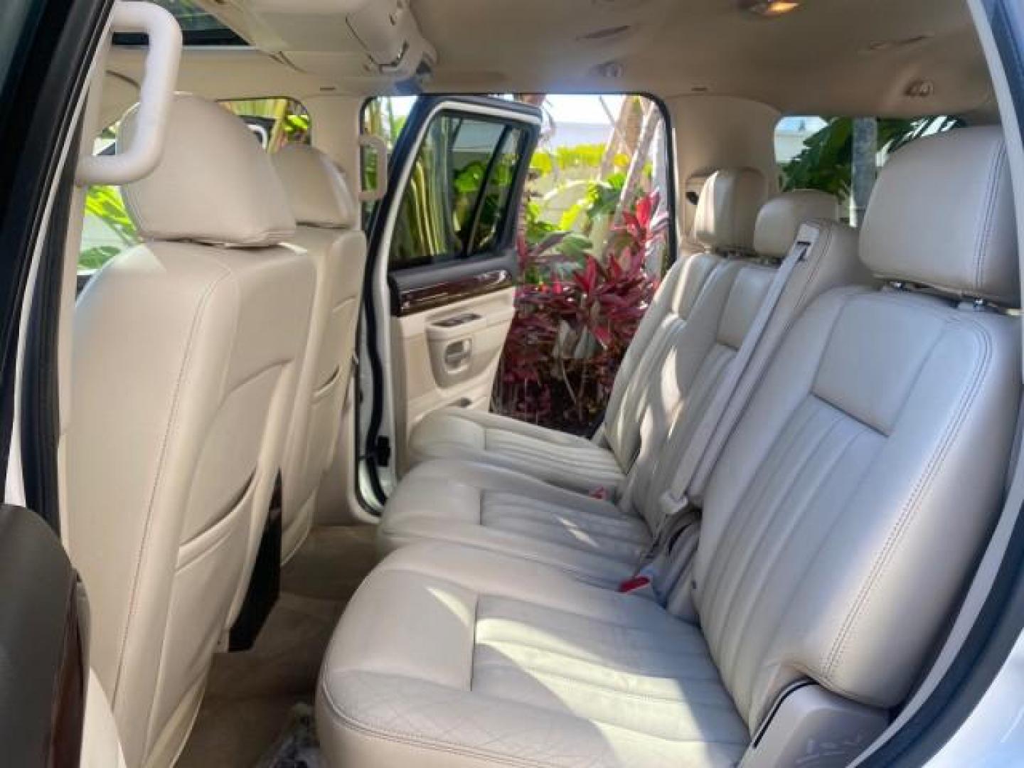 2003 Ceramic White /Light Parchment Lincoln Aviator Premium 4WD SUNROOF (5LMEU78H03Z) with an 4.6L DOHC 32-Valve V8 Engine engine, Automatic transmission, located at 4701 North Dixie Hwy, Pompano Beach, FL, 33064, (954) 422-2889, 26.240938, -80.123474 - OUR WEBPAGE FLORIDACARS1.COM HAS OVER 100 PHOTOS AND FREE CARFAX LINK 2003 LINCOLN AVIATOR PREMIUM 4WD SUNROOF $45,120 NEW TIRES LOOK VERY NICE VIN: 5LMEU78H03ZJ14425 5 L M E U 7 8 H 0 3 Z J 1 4 4 2 5 4 DOOR WAGON/SPORT UTILITY 4.6L V8 F DOHC GASOLINE 18 MPG REAR WHEEL DRIVE W/ 4X4 Features 4WD/AWD - Photo#14