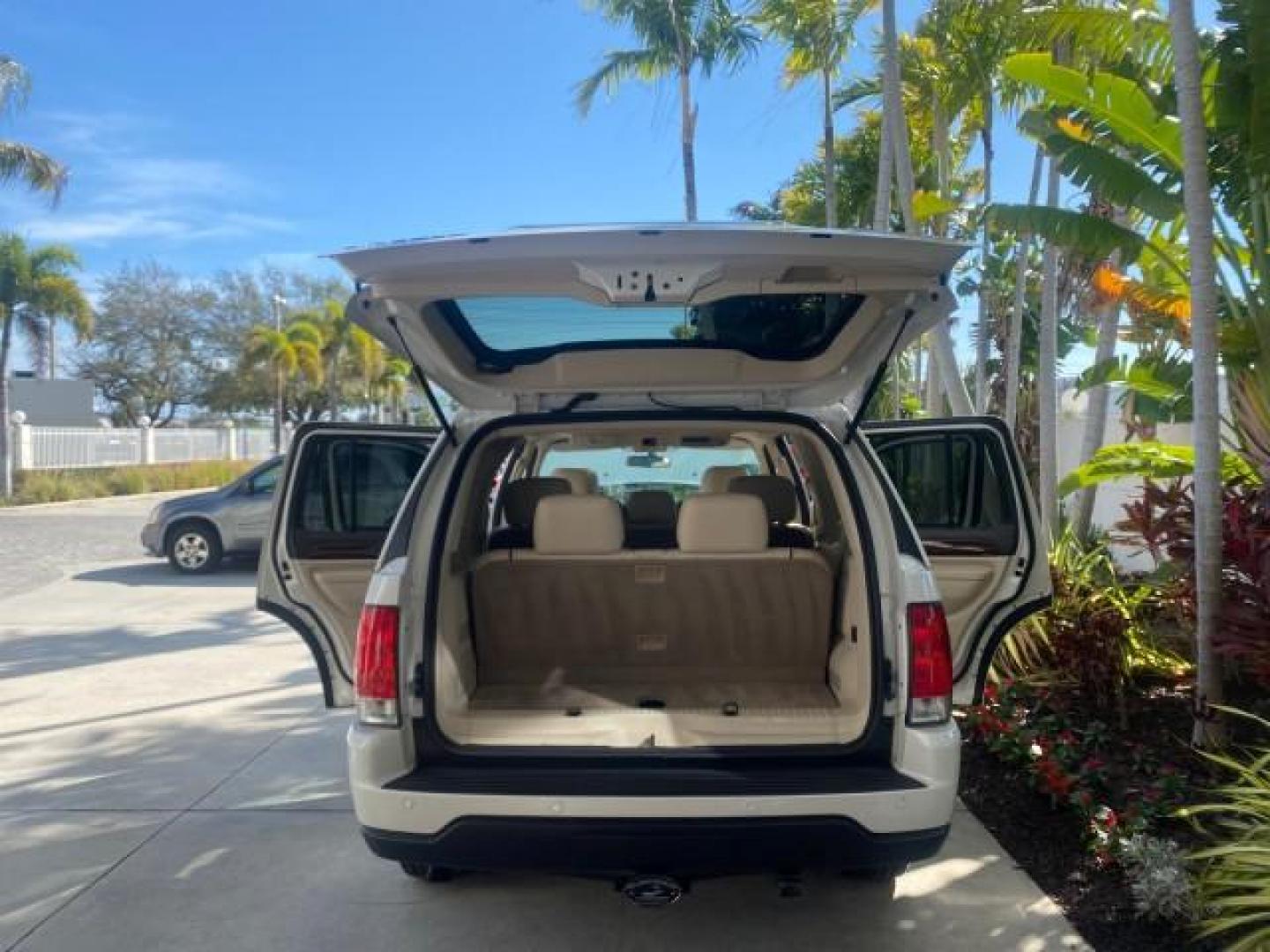 2003 Ceramic White /Light Parchment Lincoln Aviator Premium 4WD SUNROOF (5LMEU78H03Z) with an 4.6L DOHC 32-Valve V8 Engine engine, Automatic transmission, located at 4701 North Dixie Hwy, Pompano Beach, FL, 33064, (954) 422-2889, 26.240938, -80.123474 - OUR WEBPAGE FLORIDACARS1.COM HAS OVER 100 PHOTOS AND FREE CARFAX LINK 2003 LINCOLN AVIATOR PREMIUM 4WD SUNROOF $45,120 NEW TIRES LOOK VERY NICE VIN: 5LMEU78H03ZJ14425 5 L M E U 7 8 H 0 3 Z J 1 4 4 2 5 4 DOOR WAGON/SPORT UTILITY 4.6L V8 F DOHC GASOLINE 18 MPG REAR WHEEL DRIVE W/ 4X4 Features 4WD/AWD - Photo#15