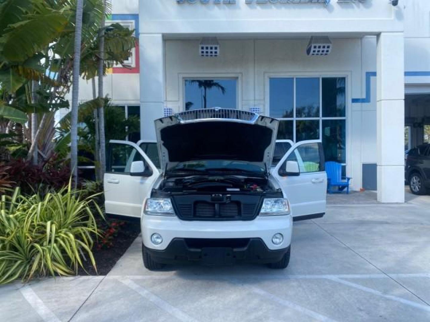 2003 Ceramic White /Light Parchment Lincoln Aviator Premium 4WD SUNROOF (5LMEU78H03Z) with an 4.6L DOHC 32-Valve V8 Engine engine, Automatic transmission, located at 4701 North Dixie Hwy, Pompano Beach, FL, 33064, (954) 422-2889, 26.240938, -80.123474 - OUR WEBPAGE FLORIDACARS1.COM HAS OVER 100 PHOTOS AND FREE CARFAX LINK 2003 LINCOLN AVIATOR PREMIUM 4WD SUNROOF $45,120 NEW TIRES LOOK VERY NICE VIN: 5LMEU78H03ZJ14425 5 L M E U 7 8 H 0 3 Z J 1 4 4 2 5 4 DOOR WAGON/SPORT UTILITY 4.6L V8 F DOHC GASOLINE 18 MPG REAR WHEEL DRIVE W/ 4X4 Features 4WD/AWD - Photo#16