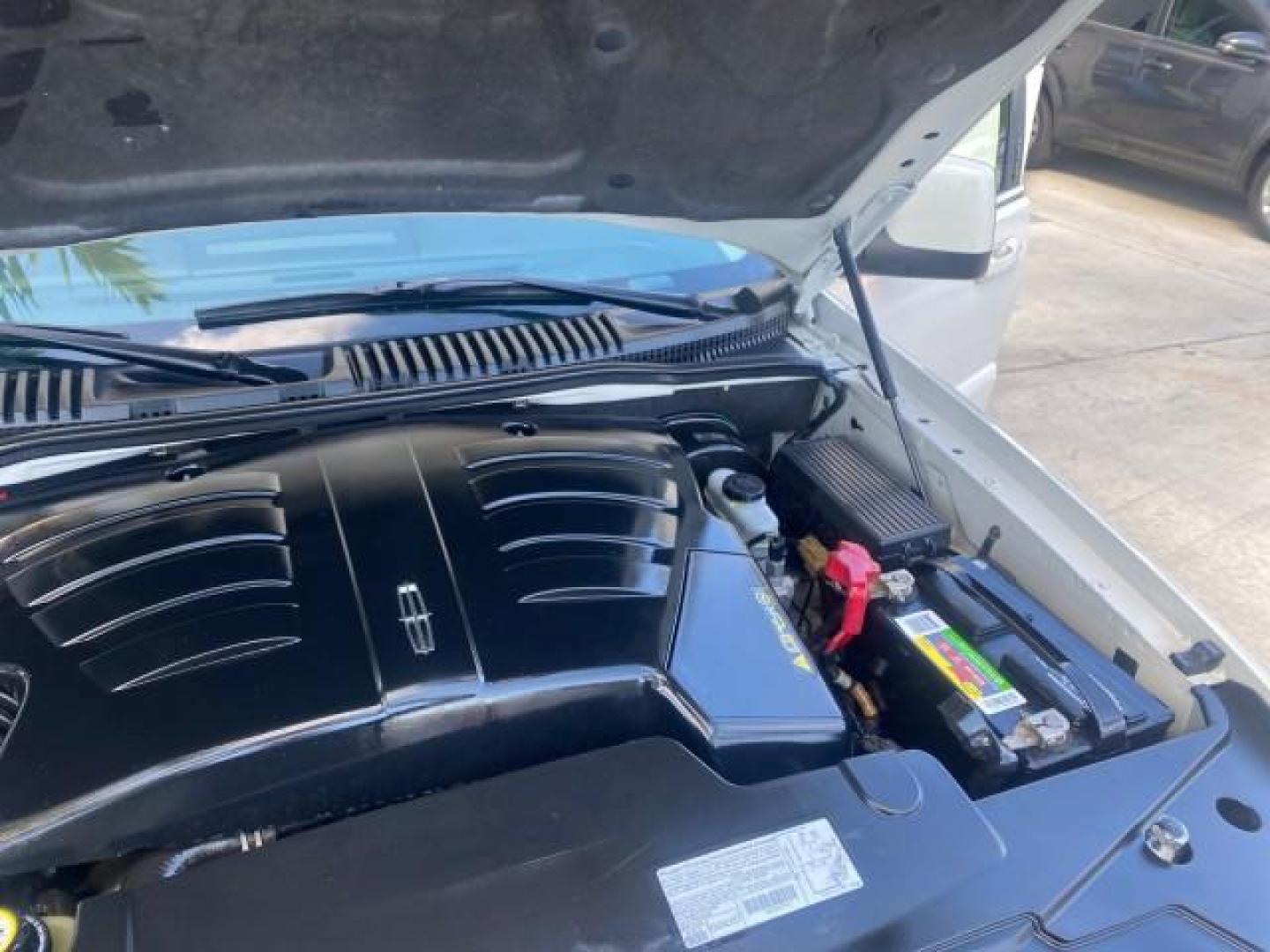 2003 Ceramic White /Light Parchment Lincoln Aviator Premium 4WD SUNROOF (5LMEU78H03Z) with an 4.6L DOHC 32-Valve V8 Engine engine, Automatic transmission, located at 4701 North Dixie Hwy, Pompano Beach, FL, 33064, (954) 422-2889, 26.240938, -80.123474 - OUR WEBPAGE FLORIDACARS1.COM HAS OVER 100 PHOTOS AND FREE CARFAX LINK 2003 LINCOLN AVIATOR PREMIUM 4WD SUNROOF $45,120 NEW TIRES LOOK VERY NICE VIN: 5LMEU78H03ZJ14425 5 L M E U 7 8 H 0 3 Z J 1 4 4 2 5 4 DOOR WAGON/SPORT UTILITY 4.6L V8 F DOHC GASOLINE 18 MPG REAR WHEEL DRIVE W/ 4X4 Features 4WD/AWD - Photo#25