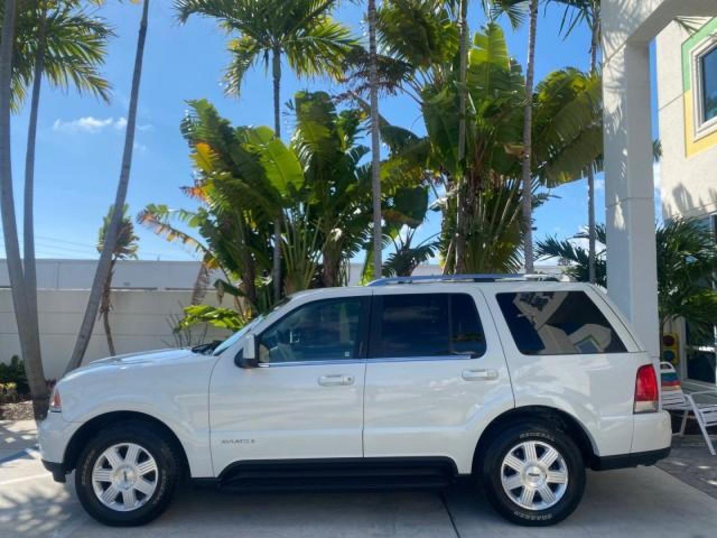 2003 Ceramic White /Light Parchment Lincoln Aviator Premium 4WD SUNROOF (5LMEU78H03Z) with an 4.6L DOHC 32-Valve V8 Engine engine, Automatic transmission, located at 4701 North Dixie Hwy, Pompano Beach, FL, 33064, (954) 422-2889, 26.240938, -80.123474 - OUR WEBPAGE FLORIDACARS1.COM HAS OVER 100 PHOTOS AND FREE CARFAX LINK 2003 LINCOLN AVIATOR PREMIUM 4WD SUNROOF $45,120 NEW TIRES LOOK VERY NICE VIN: 5LMEU78H03ZJ14425 5 L M E U 7 8 H 0 3 Z J 1 4 4 2 5 4 DOOR WAGON/SPORT UTILITY 4.6L V8 F DOHC GASOLINE 18 MPG REAR WHEEL DRIVE W/ 4X4 Features 4WD/AWD - Photo#31