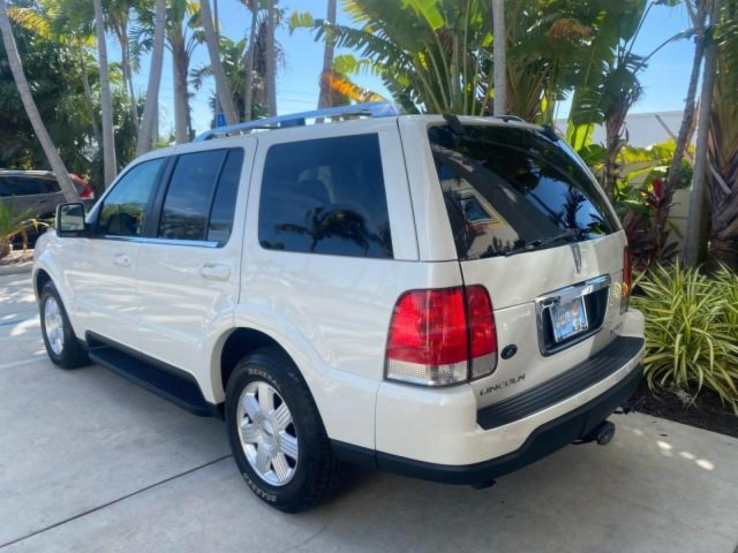 2003 Ceramic White /Light Parchment Lincoln Aviator Premium 4WD SUNROOF (5LMEU78H03Z) with an 4.6L DOHC 32-Valve V8 Engine engine, Automatic transmission, located at 4701 North Dixie Hwy, Pompano Beach, FL, 33064, (954) 422-2889, 26.240938, -80.123474 - OUR WEBPAGE FLORIDACARS1.COM HAS OVER 100 PHOTOS AND FREE CARFAX LINK 2003 LINCOLN AVIATOR PREMIUM 4WD SUNROOF $45,120 NEW TIRES LOOK VERY NICE VIN: 5LMEU78H03ZJ14425 5 L M E U 7 8 H 0 3 Z J 1 4 4 2 5 4 DOOR WAGON/SPORT UTILITY 4.6L V8 F DOHC GASOLINE 18 MPG REAR WHEEL DRIVE W/ 4X4 Features 4WD/AWD - Photo#33