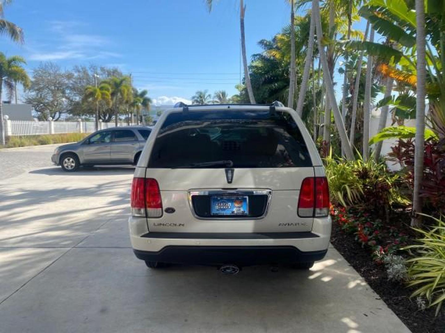 2003 Ceramic White /Light Parchment Lincoln Aviator Premium 4WD SUNROOF (5LMEU78H03Z) with an 4.6L DOHC 32-Valve V8 Engine engine, Automatic transmission, located at 4701 North Dixie Hwy, Pompano Beach, FL, 33064, (954) 422-2889, 26.240938, -80.123474 - OUR WEBPAGE FLORIDACARS1.COM HAS OVER 100 PHOTOS AND FREE CARFAX LINK 2003 LINCOLN AVIATOR PREMIUM 4WD SUNROOF $45,120 NEW TIRES LOOK VERY NICE VIN: 5LMEU78H03ZJ14425 5 L M E U 7 8 H 0 3 Z J 1 4 4 2 5 4 DOOR WAGON/SPORT UTILITY 4.6L V8 F DOHC GASOLINE 18 MPG REAR WHEEL DRIVE W/ 4X4 Features 4WD/AWD - Photo#34