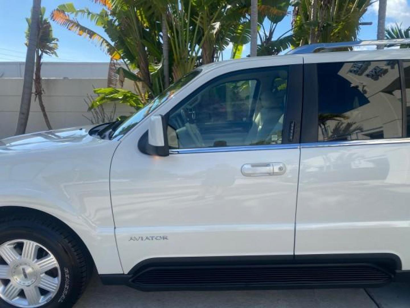 2003 Ceramic White /Light Parchment Lincoln Aviator Premium 4WD SUNROOF (5LMEU78H03Z) with an 4.6L DOHC 32-Valve V8 Engine engine, Automatic transmission, located at 4701 North Dixie Hwy, Pompano Beach, FL, 33064, (954) 422-2889, 26.240938, -80.123474 - OUR WEBPAGE FLORIDACARS1.COM HAS OVER 100 PHOTOS AND FREE CARFAX LINK 2003 LINCOLN AVIATOR PREMIUM 4WD SUNROOF $45,120 NEW TIRES LOOK VERY NICE VIN: 5LMEU78H03ZJ14425 5 L M E U 7 8 H 0 3 Z J 1 4 4 2 5 4 DOOR WAGON/SPORT UTILITY 4.6L V8 F DOHC GASOLINE 18 MPG REAR WHEEL DRIVE W/ 4X4 Features 4WD/AWD - Photo#37