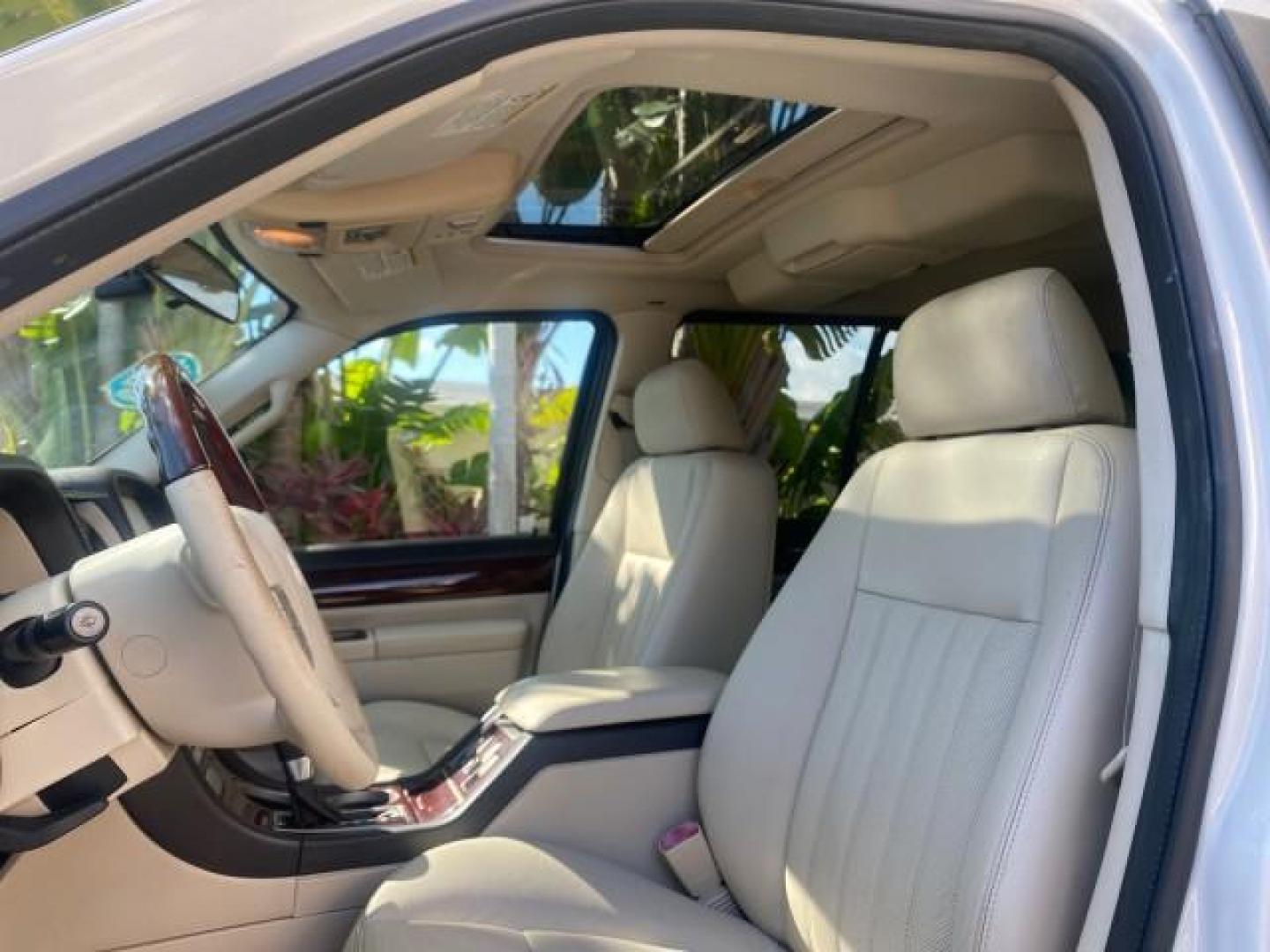 2003 Ceramic White /Light Parchment Lincoln Aviator Premium 4WD SUNROOF (5LMEU78H03Z) with an 4.6L DOHC 32-Valve V8 Engine engine, Automatic transmission, located at 4701 North Dixie Hwy, Pompano Beach, FL, 33064, (954) 422-2889, 26.240938, -80.123474 - OUR WEBPAGE FLORIDACARS1.COM HAS OVER 100 PHOTOS AND FREE CARFAX LINK 2003 LINCOLN AVIATOR PREMIUM 4WD SUNROOF $45,120 NEW TIRES LOOK VERY NICE VIN: 5LMEU78H03ZJ14425 5 L M E U 7 8 H 0 3 Z J 1 4 4 2 5 4 DOOR WAGON/SPORT UTILITY 4.6L V8 F DOHC GASOLINE 18 MPG REAR WHEEL DRIVE W/ 4X4 Features 4WD/AWD - Photo#45
