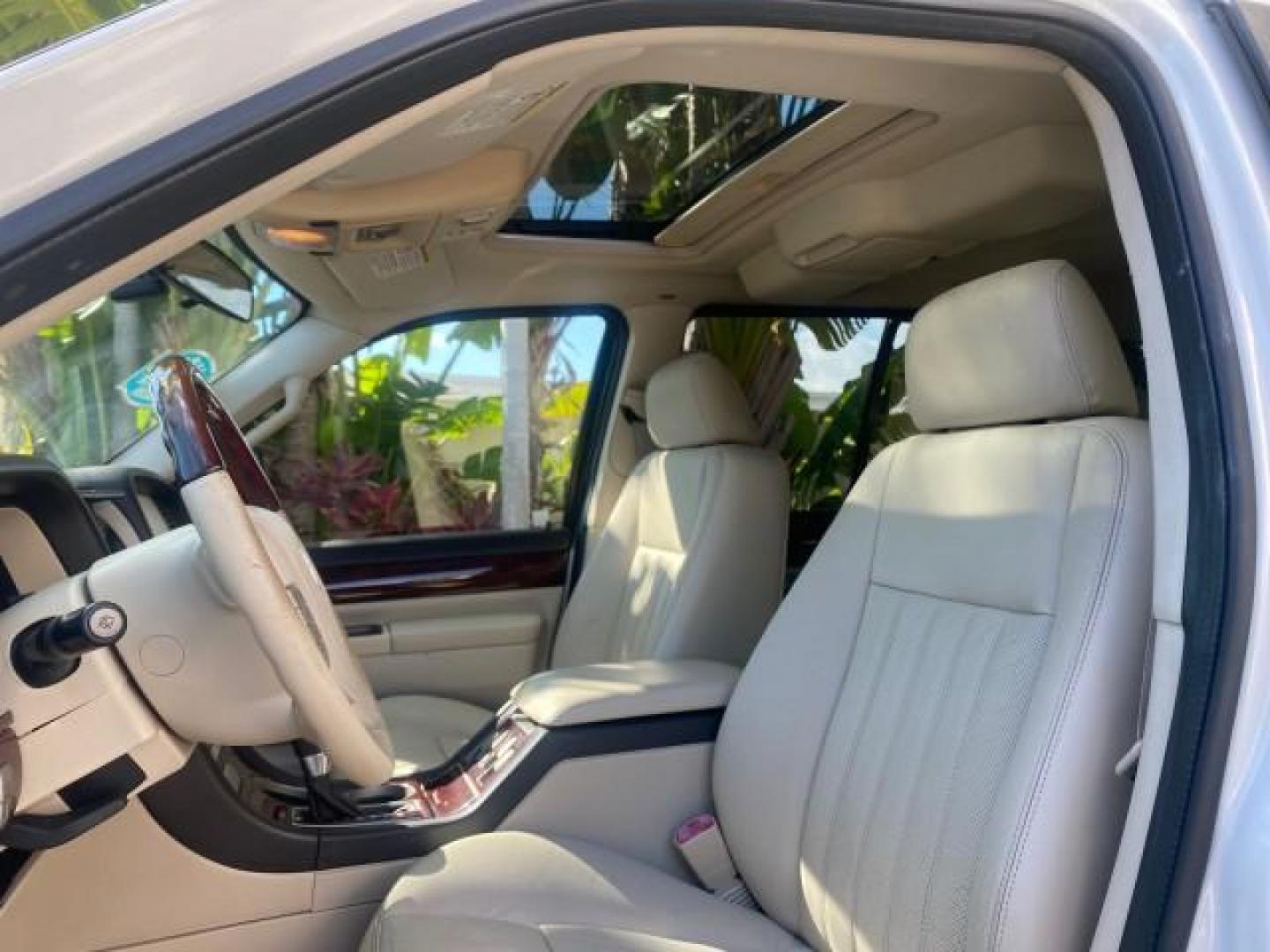 2003 Ceramic White /Light Parchment Lincoln Aviator Premium 4WD SUNROOF (5LMEU78H03Z) with an 4.6L DOHC 32-Valve V8 Engine engine, Automatic transmission, located at 4701 North Dixie Hwy, Pompano Beach, FL, 33064, (954) 422-2889, 26.240938, -80.123474 - OUR WEBPAGE FLORIDACARS1.COM HAS OVER 100 PHOTOS AND FREE CARFAX LINK 2003 LINCOLN AVIATOR PREMIUM 4WD SUNROOF $45,120 NEW TIRES LOOK VERY NICE VIN: 5LMEU78H03ZJ14425 5 L M E U 7 8 H 0 3 Z J 1 4 4 2 5 4 DOOR WAGON/SPORT UTILITY 4.6L V8 F DOHC GASOLINE 18 MPG REAR WHEEL DRIVE W/ 4X4 Features 4WD/AWD - Photo#46