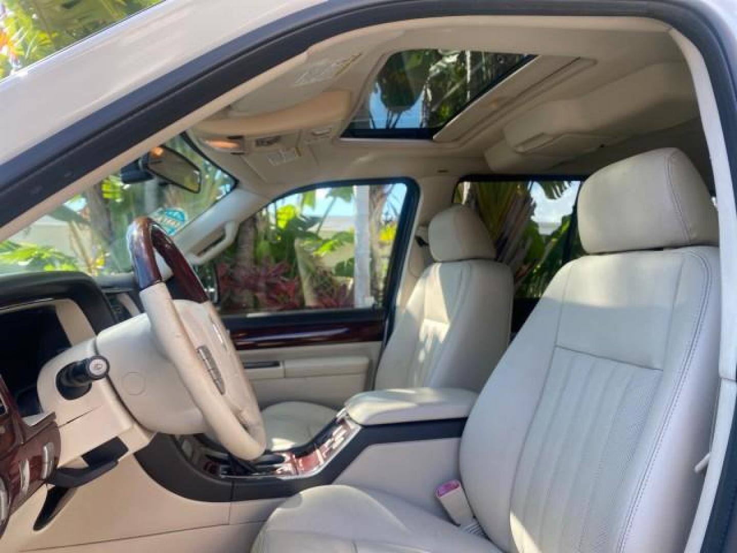 2003 Ceramic White /Light Parchment Lincoln Aviator Premium 4WD SUNROOF (5LMEU78H03Z) with an 4.6L DOHC 32-Valve V8 Engine engine, Automatic transmission, located at 4701 North Dixie Hwy, Pompano Beach, FL, 33064, (954) 422-2889, 26.240938, -80.123474 - OUR WEBPAGE FLORIDACARS1.COM HAS OVER 100 PHOTOS AND FREE CARFAX LINK 2003 LINCOLN AVIATOR PREMIUM 4WD SUNROOF $45,120 NEW TIRES LOOK VERY NICE VIN: 5LMEU78H03ZJ14425 5 L M E U 7 8 H 0 3 Z J 1 4 4 2 5 4 DOOR WAGON/SPORT UTILITY 4.6L V8 F DOHC GASOLINE 18 MPG REAR WHEEL DRIVE W/ 4X4 Features 4WD/AWD - Photo#47
