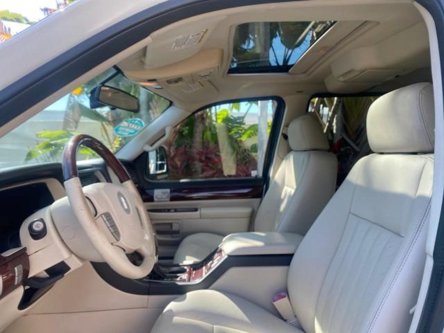 2003 Ceramic White /Light Parchment Lincoln Aviator Premium 4WD SUNROOF (5LMEU78H03Z) with an 4.6L DOHC 32-Valve V8 Engine engine, Automatic transmission, located at 4701 North Dixie Hwy, Pompano Beach, FL, 33064, (954) 422-2889, 26.240938, -80.123474 - OUR WEBPAGE FLORIDACARS1.COM HAS OVER 100 PHOTOS AND FREE CARFAX LINK 2003 LINCOLN AVIATOR PREMIUM 4WD SUNROOF $45,120 NEW TIRES LOOK VERY NICE VIN: 5LMEU78H03ZJ14425 5 L M E U 7 8 H 0 3 Z J 1 4 4 2 5 4 DOOR WAGON/SPORT UTILITY 4.6L V8 F DOHC GASOLINE 18 MPG REAR WHEEL DRIVE W/ 4X4 Features 4WD/AWD - Photo#48