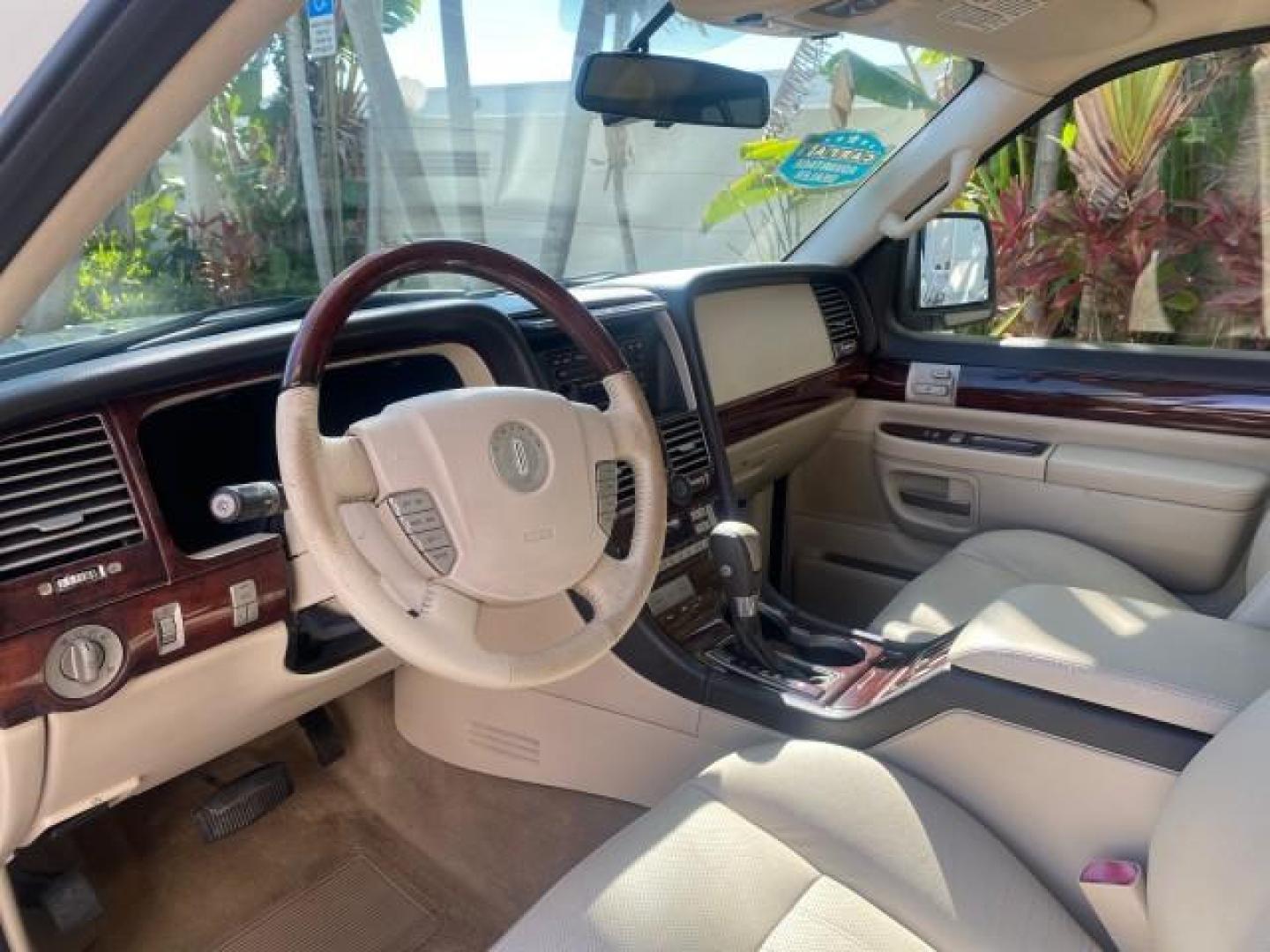 2003 Ceramic White /Light Parchment Lincoln Aviator Premium 4WD SUNROOF (5LMEU78H03Z) with an 4.6L DOHC 32-Valve V8 Engine engine, Automatic transmission, located at 4701 North Dixie Hwy, Pompano Beach, FL, 33064, (954) 422-2889, 26.240938, -80.123474 - OUR WEBPAGE FLORIDACARS1.COM HAS OVER 100 PHOTOS AND FREE CARFAX LINK 2003 LINCOLN AVIATOR PREMIUM 4WD SUNROOF $45,120 NEW TIRES LOOK VERY NICE VIN: 5LMEU78H03ZJ14425 5 L M E U 7 8 H 0 3 Z J 1 4 4 2 5 4 DOOR WAGON/SPORT UTILITY 4.6L V8 F DOHC GASOLINE 18 MPG REAR WHEEL DRIVE W/ 4X4 Features 4WD/AWD - Photo#50