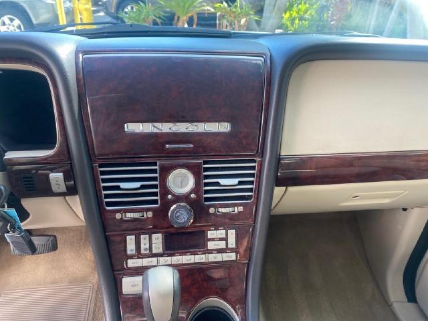 2003 Ceramic White /Light Parchment Lincoln Aviator Premium 4WD SUNROOF (5LMEU78H03Z) with an 4.6L DOHC 32-Valve V8 Engine engine, Automatic transmission, located at 4701 North Dixie Hwy, Pompano Beach, FL, 33064, (954) 422-2889, 26.240938, -80.123474 - OUR WEBPAGE FLORIDACARS1.COM HAS OVER 100 PHOTOS AND FREE CARFAX LINK 2003 LINCOLN AVIATOR PREMIUM 4WD SUNROOF $45,120 NEW TIRES LOOK VERY NICE VIN: 5LMEU78H03ZJ14425 5 L M E U 7 8 H 0 3 Z J 1 4 4 2 5 4 DOOR WAGON/SPORT UTILITY 4.6L V8 F DOHC GASOLINE 18 MPG REAR WHEEL DRIVE W/ 4X4 Features 4WD/AWD - Photo#60