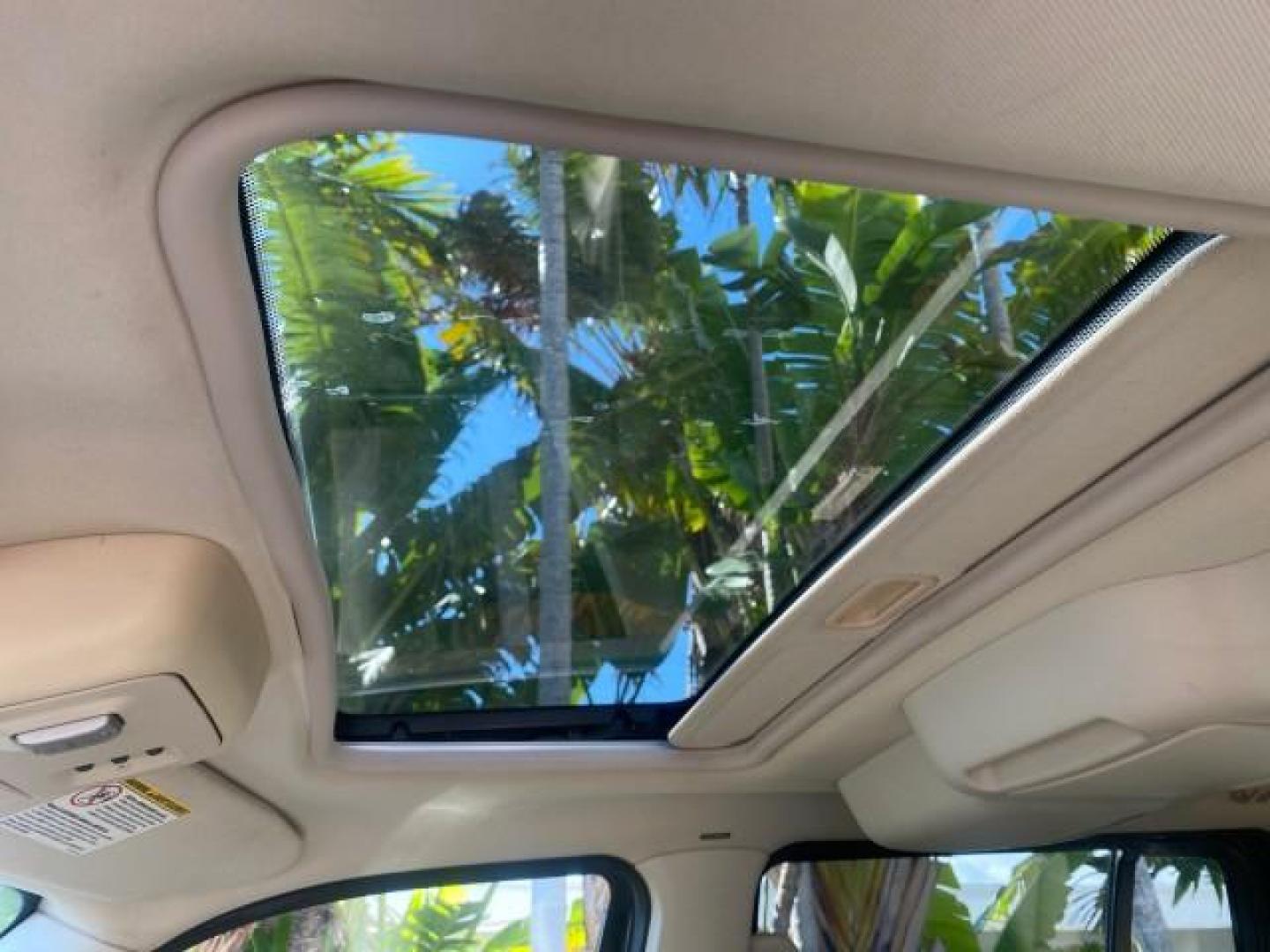 2003 Ceramic White /Light Parchment Lincoln Aviator Premium 4WD SUNROOF (5LMEU78H03Z) with an 4.6L DOHC 32-Valve V8 Engine engine, Automatic transmission, located at 4701 North Dixie Hwy, Pompano Beach, FL, 33064, (954) 422-2889, 26.240938, -80.123474 - OUR WEBPAGE FLORIDACARS1.COM HAS OVER 100 PHOTOS AND FREE CARFAX LINK 2003 LINCOLN AVIATOR PREMIUM 4WD SUNROOF $45,120 NEW TIRES LOOK VERY NICE VIN: 5LMEU78H03ZJ14425 5 L M E U 7 8 H 0 3 Z J 1 4 4 2 5 4 DOOR WAGON/SPORT UTILITY 4.6L V8 F DOHC GASOLINE 18 MPG REAR WHEEL DRIVE W/ 4X4 Features 4WD/AWD - Photo#76