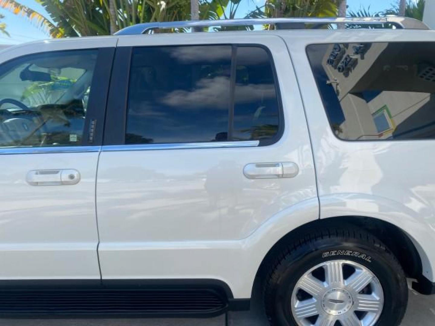 2003 Ceramic White /Light Parchment Lincoln Aviator Premium 4WD SUNROOF (5LMEU78H03Z) with an 4.6L DOHC 32-Valve V8 Engine engine, Automatic transmission, located at 4701 North Dixie Hwy, Pompano Beach, FL, 33064, (954) 422-2889, 26.240938, -80.123474 - OUR WEBPAGE FLORIDACARS1.COM HAS OVER 100 PHOTOS AND FREE CARFAX LINK 2003 LINCOLN AVIATOR PREMIUM 4WD SUNROOF $45,120 NEW TIRES LOOK VERY NICE VIN: 5LMEU78H03ZJ14425 5 L M E U 7 8 H 0 3 Z J 1 4 4 2 5 4 DOOR WAGON/SPORT UTILITY 4.6L V8 F DOHC GASOLINE 18 MPG REAR WHEEL DRIVE W/ 4X4 Features 4WD/AWD - Photo#80