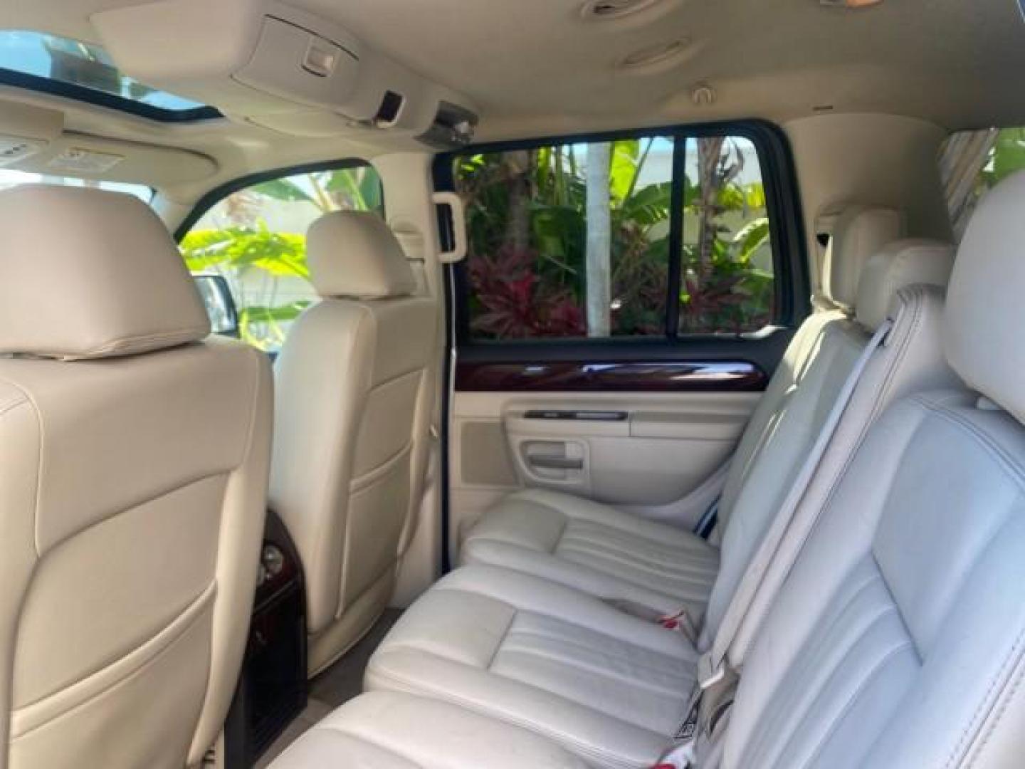 2003 Ceramic White /Light Parchment Lincoln Aviator Premium 4WD SUNROOF (5LMEU78H03Z) with an 4.6L DOHC 32-Valve V8 Engine engine, Automatic transmission, located at 4701 North Dixie Hwy, Pompano Beach, FL, 33064, (954) 422-2889, 26.240938, -80.123474 - OUR WEBPAGE FLORIDACARS1.COM HAS OVER 100 PHOTOS AND FREE CARFAX LINK 2003 LINCOLN AVIATOR PREMIUM 4WD SUNROOF $45,120 NEW TIRES LOOK VERY NICE VIN: 5LMEU78H03ZJ14425 5 L M E U 7 8 H 0 3 Z J 1 4 4 2 5 4 DOOR WAGON/SPORT UTILITY 4.6L V8 F DOHC GASOLINE 18 MPG REAR WHEEL DRIVE W/ 4X4 Features 4WD/AWD - Photo#85