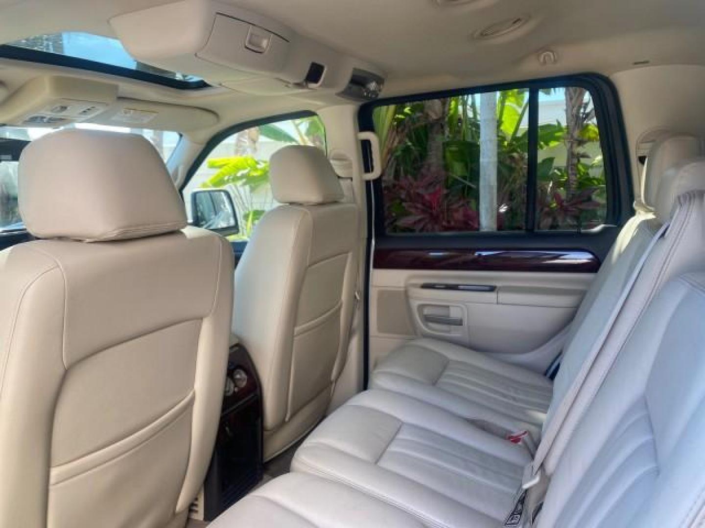 2003 Ceramic White /Light Parchment Lincoln Aviator Premium 4WD SUNROOF (5LMEU78H03Z) with an 4.6L DOHC 32-Valve V8 Engine engine, Automatic transmission, located at 4701 North Dixie Hwy, Pompano Beach, FL, 33064, (954) 422-2889, 26.240938, -80.123474 - OUR WEBPAGE FLORIDACARS1.COM HAS OVER 100 PHOTOS AND FREE CARFAX LINK 2003 LINCOLN AVIATOR PREMIUM 4WD SUNROOF $45,120 NEW TIRES LOOK VERY NICE VIN: 5LMEU78H03ZJ14425 5 L M E U 7 8 H 0 3 Z J 1 4 4 2 5 4 DOOR WAGON/SPORT UTILITY 4.6L V8 F DOHC GASOLINE 18 MPG REAR WHEEL DRIVE W/ 4X4 Features 4WD/AWD - Photo#86
