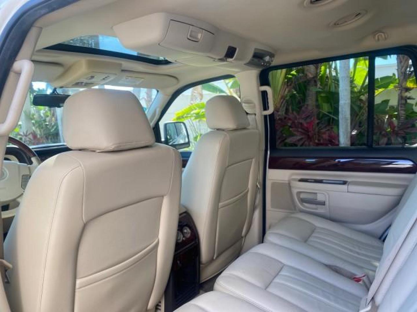 2003 Ceramic White /Light Parchment Lincoln Aviator Premium 4WD SUNROOF (5LMEU78H03Z) with an 4.6L DOHC 32-Valve V8 Engine engine, Automatic transmission, located at 4701 North Dixie Hwy, Pompano Beach, FL, 33064, (954) 422-2889, 26.240938, -80.123474 - OUR WEBPAGE FLORIDACARS1.COM HAS OVER 100 PHOTOS AND FREE CARFAX LINK 2003 LINCOLN AVIATOR PREMIUM 4WD SUNROOF $45,120 NEW TIRES LOOK VERY NICE VIN: 5LMEU78H03ZJ14425 5 L M E U 7 8 H 0 3 Z J 1 4 4 2 5 4 DOOR WAGON/SPORT UTILITY 4.6L V8 F DOHC GASOLINE 18 MPG REAR WHEEL DRIVE W/ 4X4 Features 4WD/AWD - Photo#87