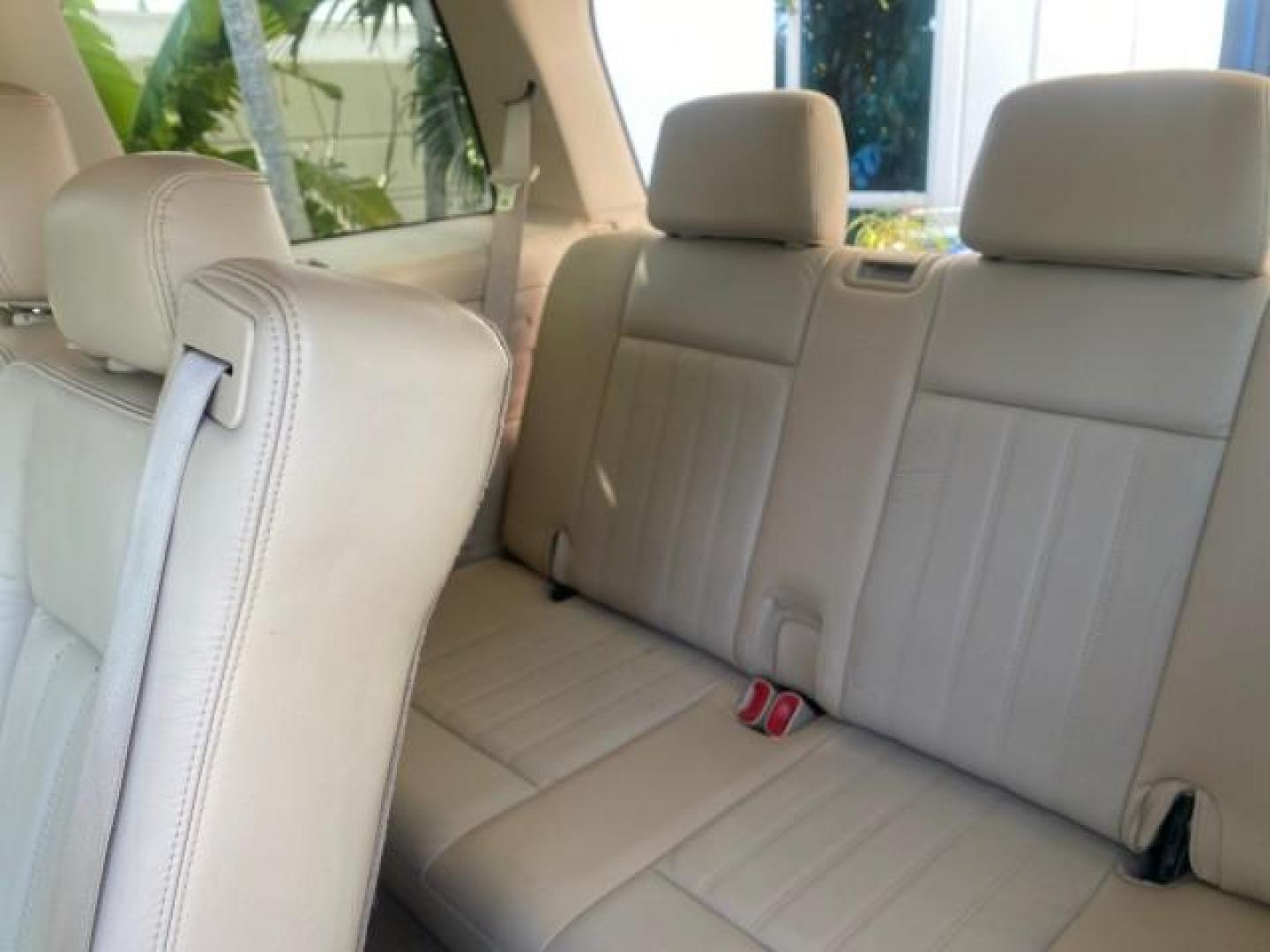 2003 Ceramic White /Light Parchment Lincoln Aviator Premium 4WD SUNROOF (5LMEU78H03Z) with an 4.6L DOHC 32-Valve V8 Engine engine, Automatic transmission, located at 4701 North Dixie Hwy, Pompano Beach, FL, 33064, (954) 422-2889, 26.240938, -80.123474 - OUR WEBPAGE FLORIDACARS1.COM HAS OVER 100 PHOTOS AND FREE CARFAX LINK 2003 LINCOLN AVIATOR PREMIUM 4WD SUNROOF $45,120 NEW TIRES LOOK VERY NICE VIN: 5LMEU78H03ZJ14425 5 L M E U 7 8 H 0 3 Z J 1 4 4 2 5 4 DOOR WAGON/SPORT UTILITY 4.6L V8 F DOHC GASOLINE 18 MPG REAR WHEEL DRIVE W/ 4X4 Features 4WD/AWD - Photo#89