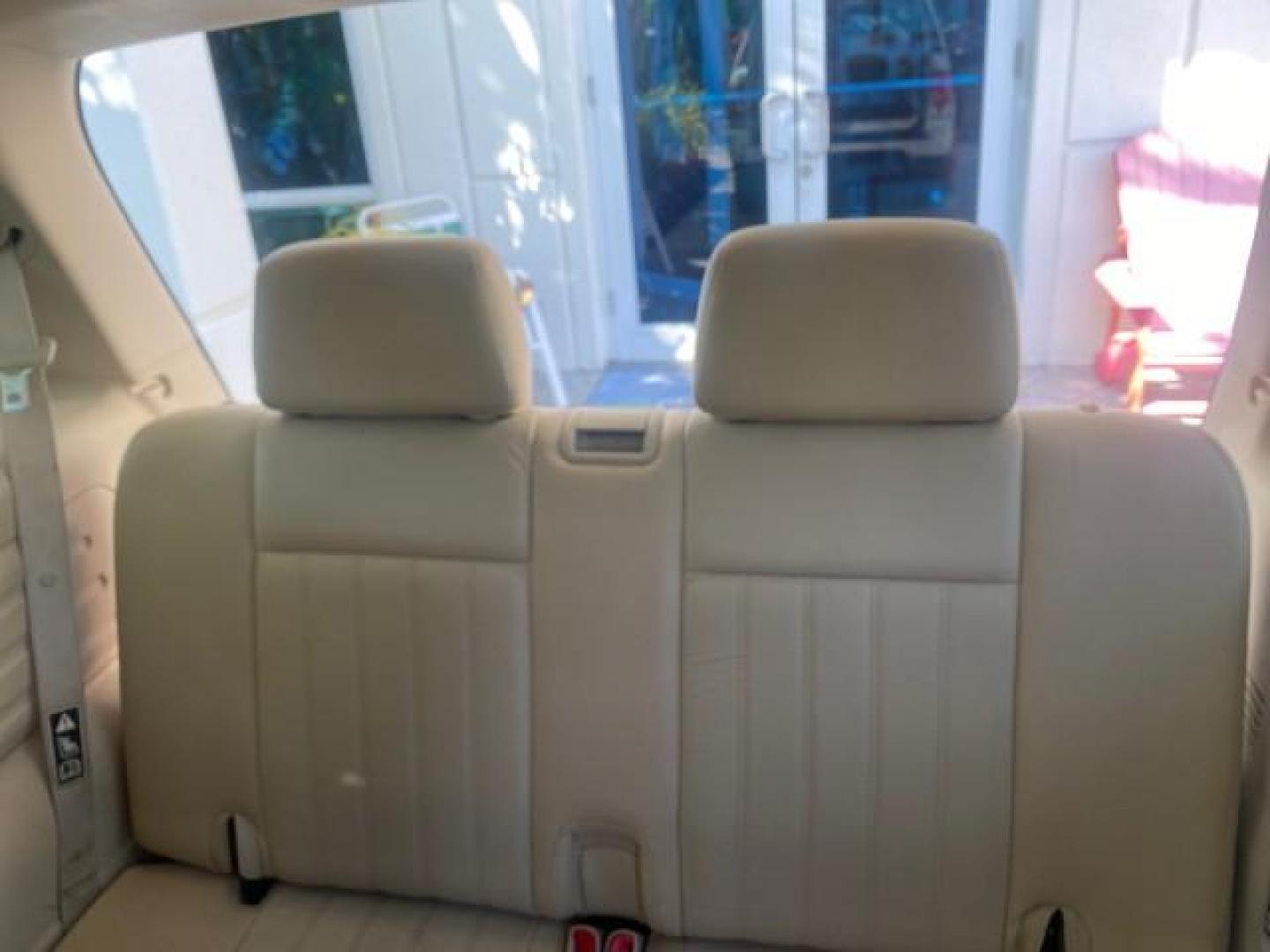 2003 Ceramic White /Light Parchment Lincoln Aviator Premium 4WD SUNROOF (5LMEU78H03Z) with an 4.6L DOHC 32-Valve V8 Engine engine, Automatic transmission, located at 4701 North Dixie Hwy, Pompano Beach, FL, 33064, (954) 422-2889, 26.240938, -80.123474 - OUR WEBPAGE FLORIDACARS1.COM HAS OVER 100 PHOTOS AND FREE CARFAX LINK 2003 LINCOLN AVIATOR PREMIUM 4WD SUNROOF $45,120 NEW TIRES LOOK VERY NICE VIN: 5LMEU78H03ZJ14425 5 L M E U 7 8 H 0 3 Z J 1 4 4 2 5 4 DOOR WAGON/SPORT UTILITY 4.6L V8 F DOHC GASOLINE 18 MPG REAR WHEEL DRIVE W/ 4X4 Features 4WD/AWD - Photo#90