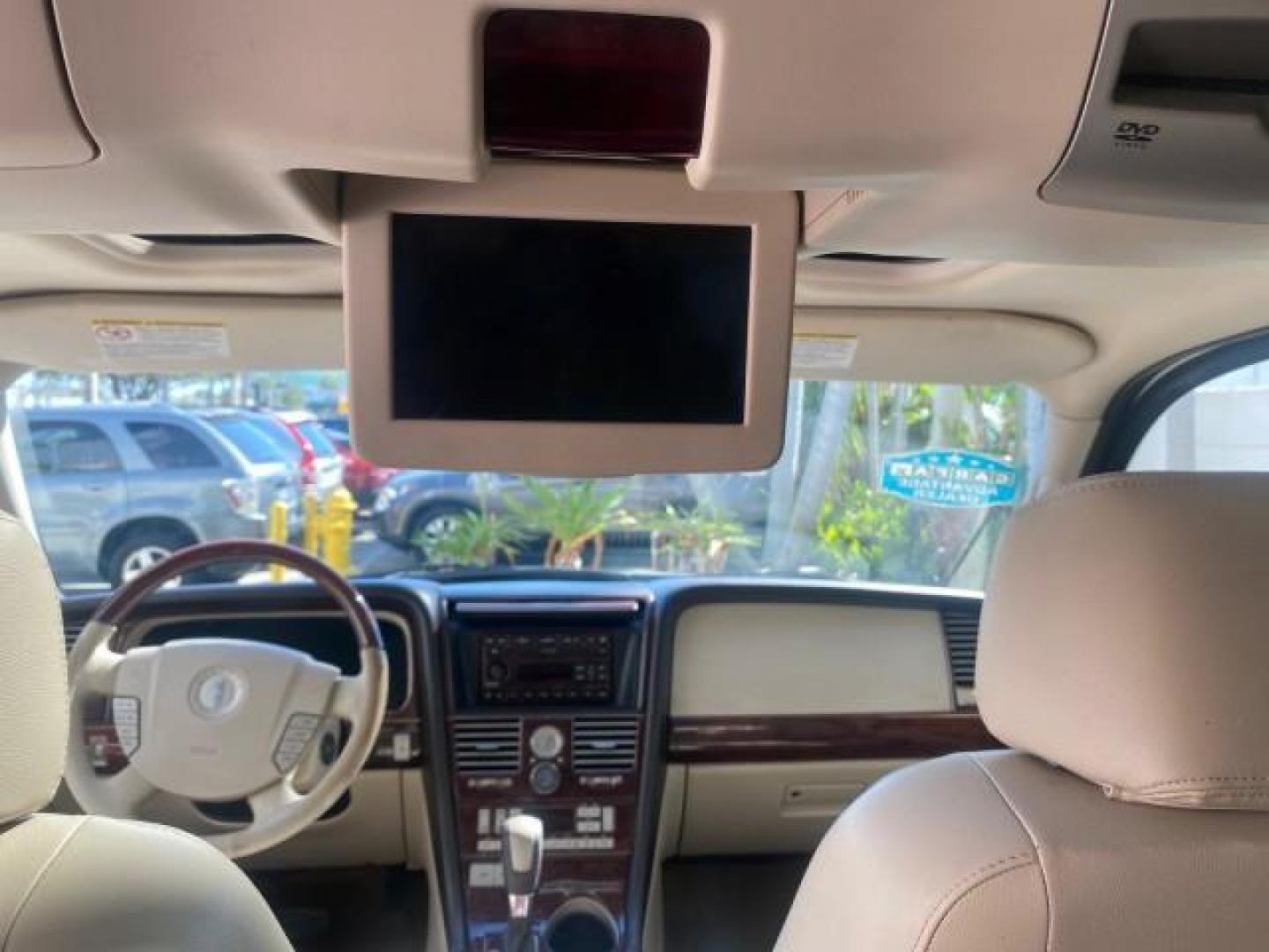 2003 Ceramic White /Light Parchment Lincoln Aviator Premium 4WD SUNROOF (5LMEU78H03Z) with an 4.6L DOHC 32-Valve V8 Engine engine, Automatic transmission, located at 4701 North Dixie Hwy, Pompano Beach, FL, 33064, (954) 422-2889, 26.240938, -80.123474 - OUR WEBPAGE FLORIDACARS1.COM HAS OVER 100 PHOTOS AND FREE CARFAX LINK 2003 LINCOLN AVIATOR PREMIUM 4WD SUNROOF $45,120 NEW TIRES LOOK VERY NICE VIN: 5LMEU78H03ZJ14425 5 L M E U 7 8 H 0 3 Z J 1 4 4 2 5 4 DOOR WAGON/SPORT UTILITY 4.6L V8 F DOHC GASOLINE 18 MPG REAR WHEEL DRIVE W/ 4X4 Features 4WD/AWD - Photo#92