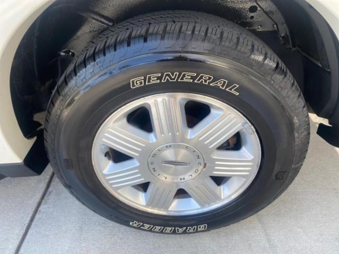 2003 Ceramic White /Light Parchment Lincoln Aviator Premium 4WD SUNROOF (5LMEU78H03Z) with an 4.6L DOHC 32-Valve V8 Engine engine, Automatic transmission, located at 4701 North Dixie Hwy, Pompano Beach, FL, 33064, (954) 422-2889, 26.240938, -80.123474 - OUR WEBPAGE FLORIDACARS1.COM HAS OVER 100 PHOTOS AND FREE CARFAX LINK 2003 LINCOLN AVIATOR PREMIUM 4WD SUNROOF $45,120 NEW TIRES LOOK VERY NICE VIN: 5LMEU78H03ZJ14425 5 L M E U 7 8 H 0 3 Z J 1 4 4 2 5 4 DOOR WAGON/SPORT UTILITY 4.6L V8 F DOHC GASOLINE 18 MPG REAR WHEEL DRIVE W/ 4X4 Features 4WD/AWD - Photo#96