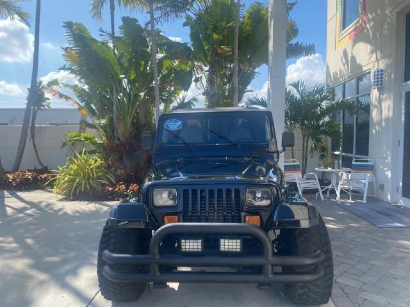 1994 Black /Gray Jeep Wrangler 4.0 6 CYL SE LOW MILES 87,813 (1J4FY29S8RP) with an 4.0L Straight 6-Cyl Engine engine, Automatic transmission, located at 4701 North Dixie Hwy, Pompano Beach, FL, 33064, (954) 422-2889, 26.240938, -80.123474 - OUR WEBPAGE FLORIDACARS1.COM HAS OVER 100 PHOTOS AND FREE CARFAX LINK 1994 JEEP WRANGLER SE AUTO AC BRAND NEW TOP WITH HARDWARE $ 2000 VALUE INCLUDED VIN: 1J4FY29S8RP433289 1 J 4 F Y 2 9 S 8 R P 4 3 3 2 8 9 UTILITY (BLAZER, JIMMY, SCOUT, ETC.) 4.0L I6 F GASOLINE REAR WHEEL DRIVE W/ 4X4 Features ABS - Photo#2