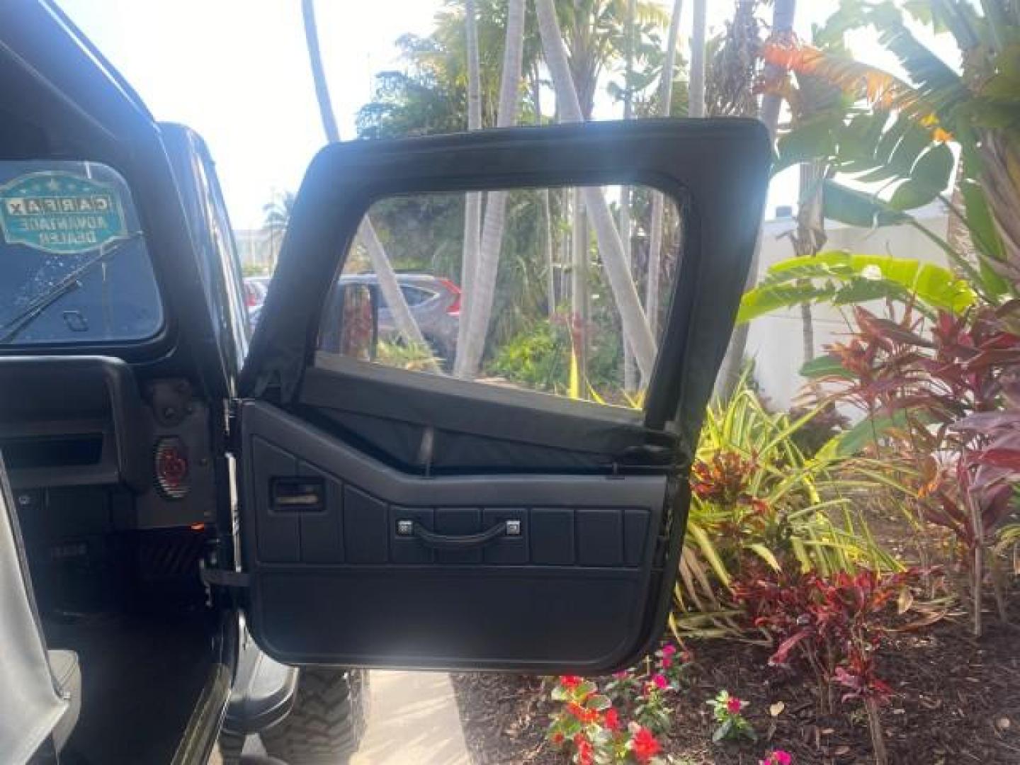 1994 Black /Gray Jeep Wrangler 4.0 6 CYL SE LOW MILES 87,813 (1J4FY29S8RP) with an 4.0L Straight 6-Cyl Engine engine, Automatic transmission, located at 4701 North Dixie Hwy, Pompano Beach, FL, 33064, (954) 422-2889, 26.240938, -80.123474 - OUR WEBPAGE FLORIDACARS1.COM HAS OVER 100 PHOTOS AND FREE CARFAX LINK 1994 JEEP WRANGLER SE AUTO AC BRAND NEW TOP WITH HARDWARE $ 2000 VALUE INCLUDED VIN: 1J4FY29S8RP433289 1 J 4 F Y 2 9 S 8 R P 4 3 3 2 8 9 UTILITY (BLAZER, JIMMY, SCOUT, ETC.) 4.0L I6 F GASOLINE REAR WHEEL DRIVE W/ 4X4 Features ABS - Photo#11
