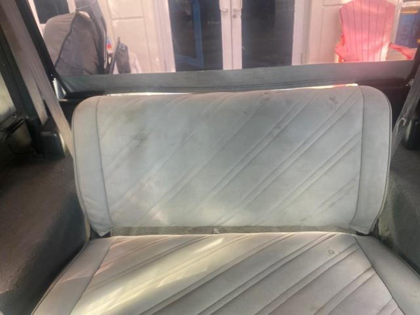 1994 Black /Gray Jeep Wrangler 4.0 6 CYL SE LOW MILES 87,813 (1J4FY29S8RP) with an 4.0L Straight 6-Cyl Engine engine, Automatic transmission, located at 4701 North Dixie Hwy, Pompano Beach, FL, 33064, (954) 422-2889, 26.240938, -80.123474 - OUR WEBPAGE FLORIDACARS1.COM HAS OVER 100 PHOTOS AND FREE CARFAX LINK 1994 JEEP WRANGLER SE AUTO AC BRAND NEW TOP WITH HARDWARE $ 2000 VALUE INCLUDED VIN: 1J4FY29S8RP433289 1 J 4 F Y 2 9 S 8 R P 4 3 3 2 8 9 UTILITY (BLAZER, JIMMY, SCOUT, ETC.) 4.0L I6 F GASOLINE REAR WHEEL DRIVE W/ 4X4 Features ABS - Photo#14