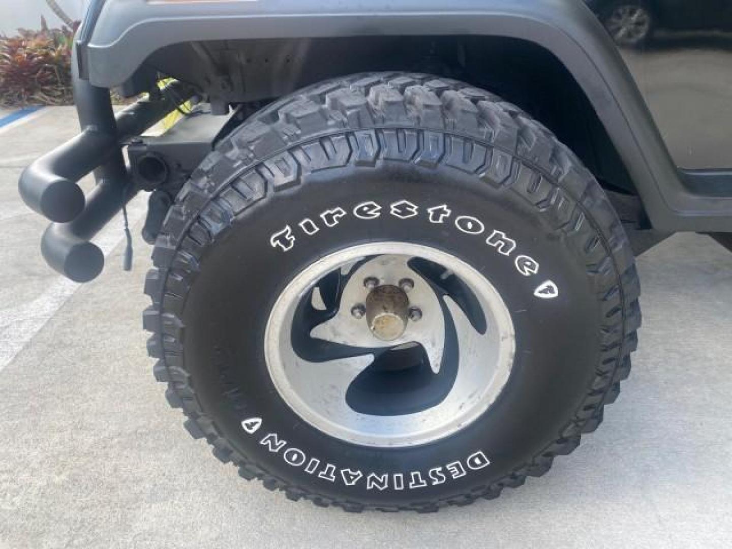 1994 Black /Gray Jeep Wrangler 4.0 6 CYL SE LOW MILES 87,813 (1J4FY29S8RP) with an 4.0L Straight 6-Cyl Engine engine, Automatic transmission, located at 4701 North Dixie Hwy, Pompano Beach, FL, 33064, (954) 422-2889, 26.240938, -80.123474 - OUR WEBPAGE FLORIDACARS1.COM HAS OVER 100 PHOTOS AND FREE CARFAX LINK 1994 JEEP WRANGLER SE AUTO AC BRAND NEW TOP WITH HARDWARE $ 2000 VALUE INCLUDED VIN: 1J4FY29S8RP433289 1 J 4 F Y 2 9 S 8 R P 4 3 3 2 8 9 UTILITY (BLAZER, JIMMY, SCOUT, ETC.) 4.0L I6 F GASOLINE REAR WHEEL DRIVE W/ 4X4 Features ABS - Photo#19