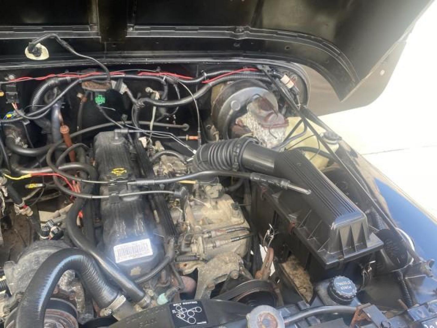 1994 Black /Gray Jeep Wrangler 4.0 6 CYL SE LOW MILES 87,813 (1J4FY29S8RP) with an 4.0L Straight 6-Cyl Engine engine, Automatic transmission, located at 4701 North Dixie Hwy, Pompano Beach, FL, 33064, (954) 422-2889, 26.240938, -80.123474 - OUR WEBPAGE FLORIDACARS1.COM HAS OVER 100 PHOTOS AND FREE CARFAX LINK 1994 JEEP WRANGLER SE AUTO AC BRAND NEW TOP WITH HARDWARE $ 2000 VALUE INCLUDED VIN: 1J4FY29S8RP433289 1 J 4 F Y 2 9 S 8 R P 4 3 3 2 8 9 UTILITY (BLAZER, JIMMY, SCOUT, ETC.) 4.0L I6 F GASOLINE REAR WHEEL DRIVE W/ 4X4 Features ABS - Photo#25